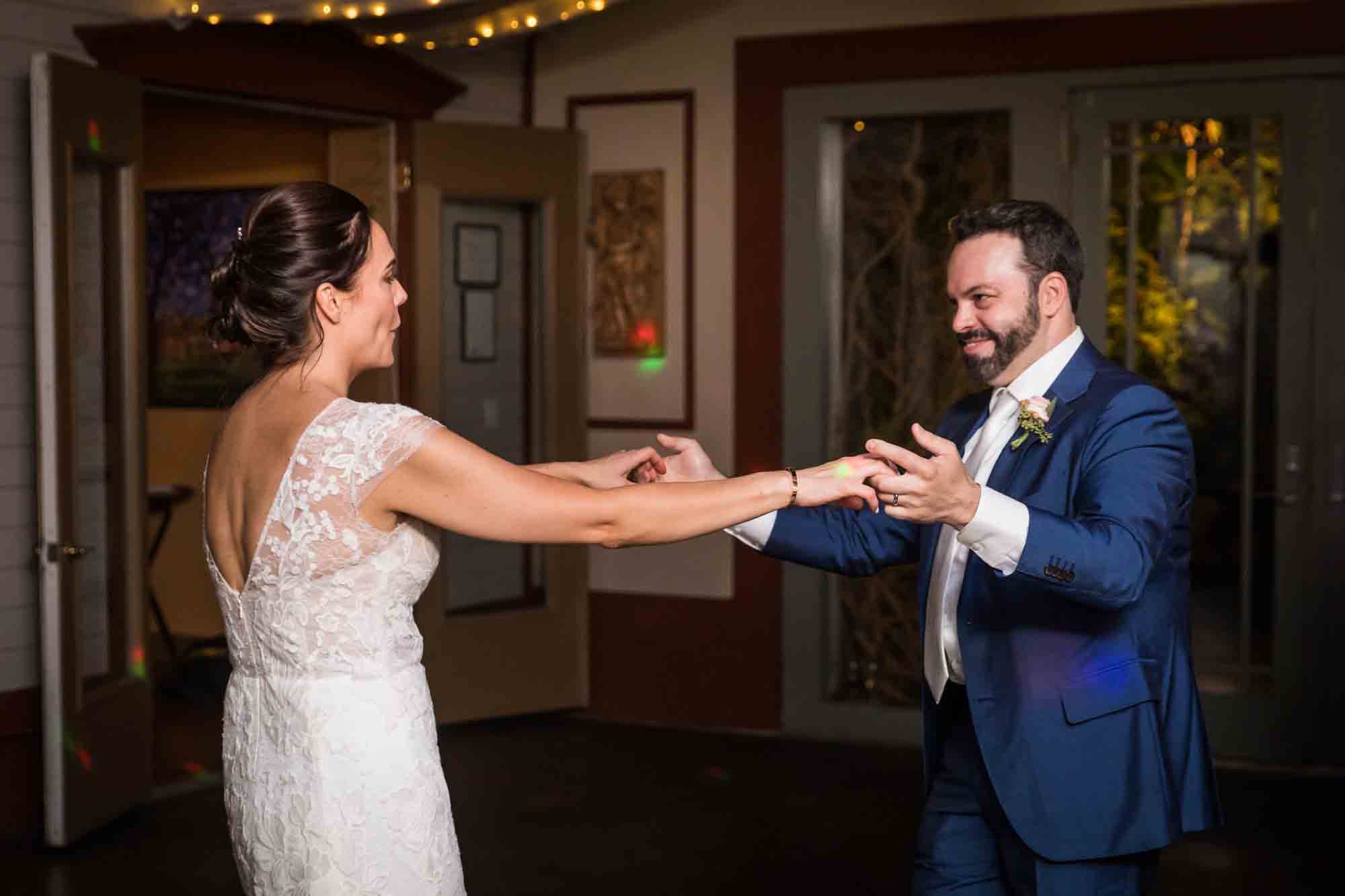 FEAST at Round Hill wedding photos of bride and groom dancing at reception