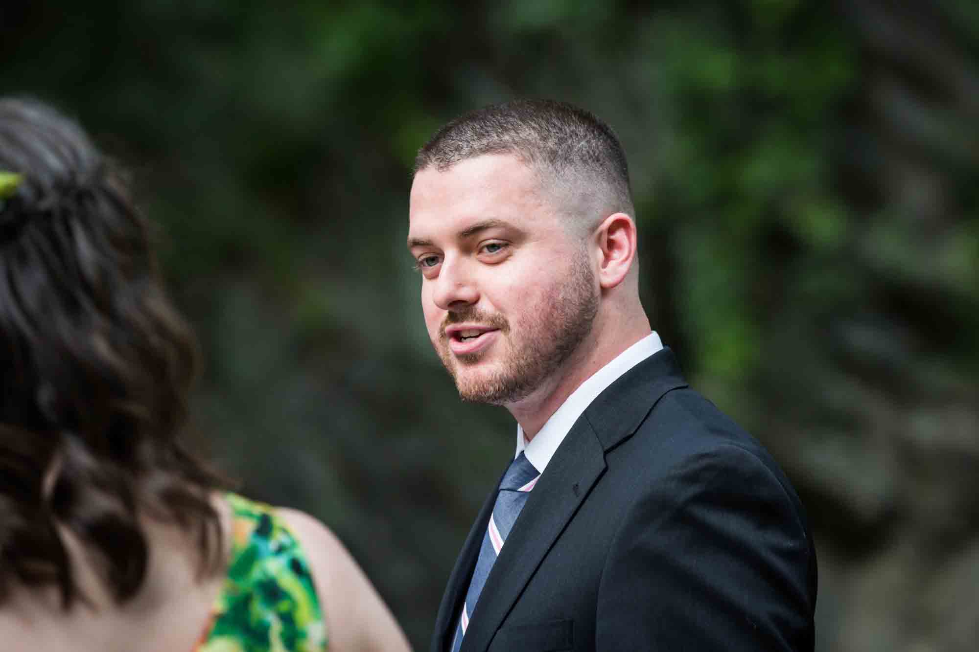 Officiant during Fort Tryon Park ceremony for an article on how to select a wedding date