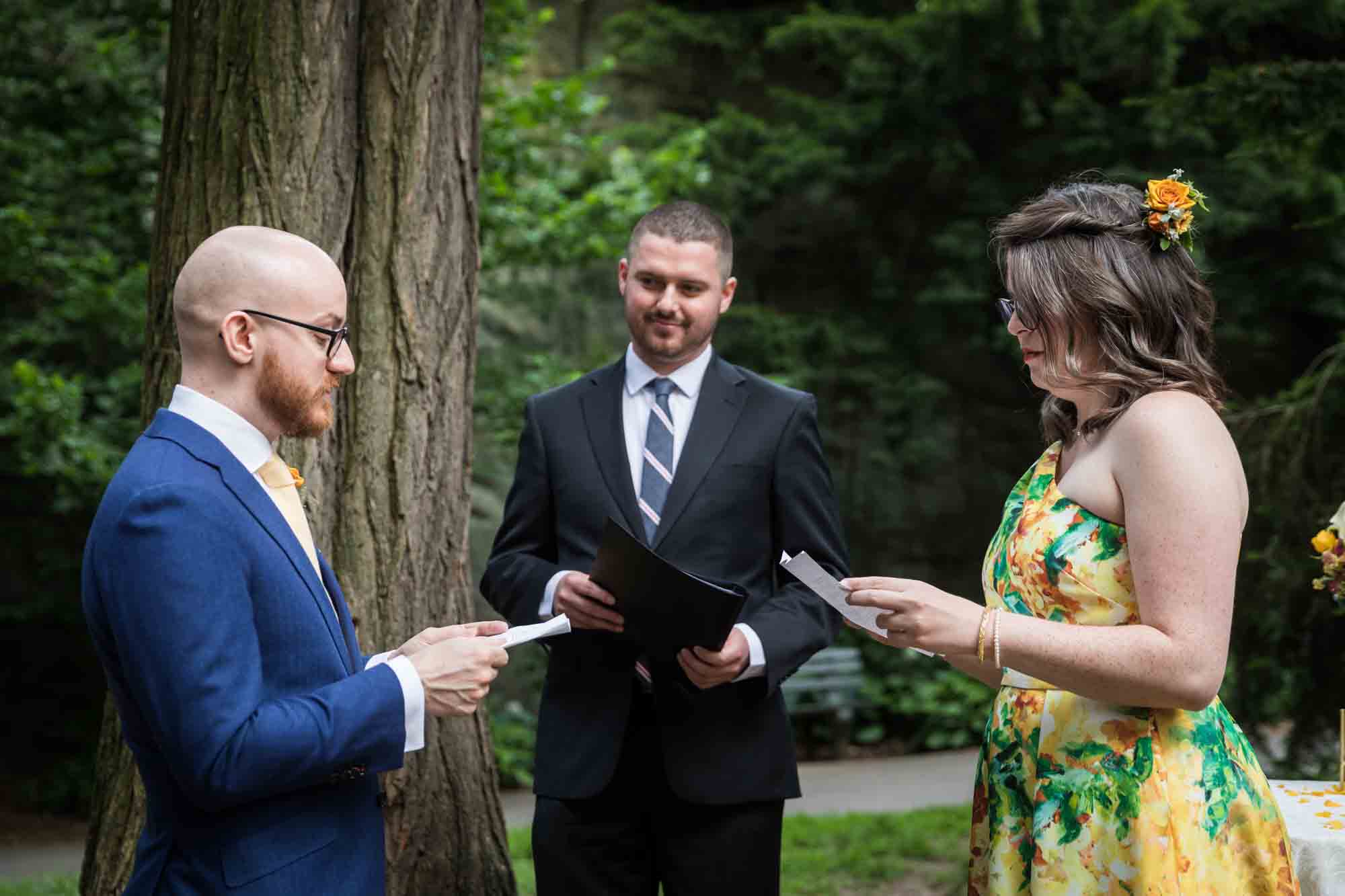 Bride and groom saying vows for an article on how to select a wedding date