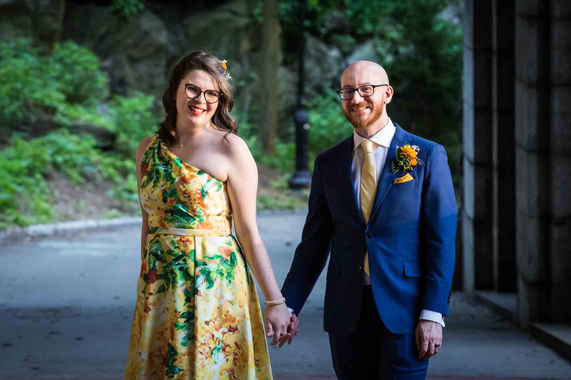 Fort Tryon wedding photos of bride and groom holding hands