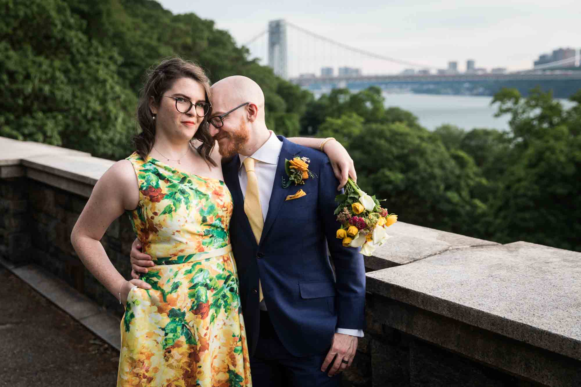 Fort Tryon wedding photos of groom with head bent towards bride