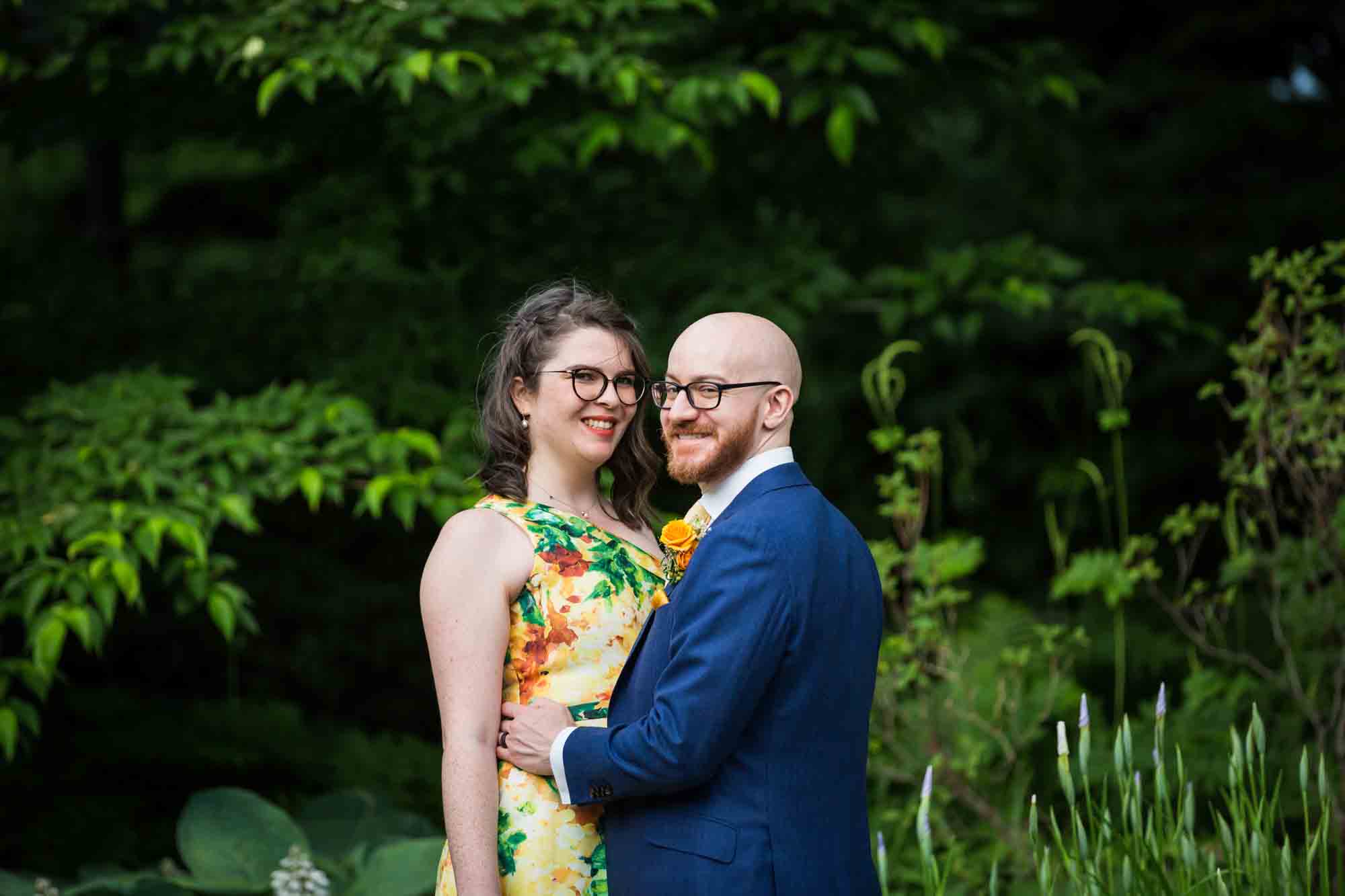 Fort Tryon wedding photos of bride and groom hugging in Heather Garden