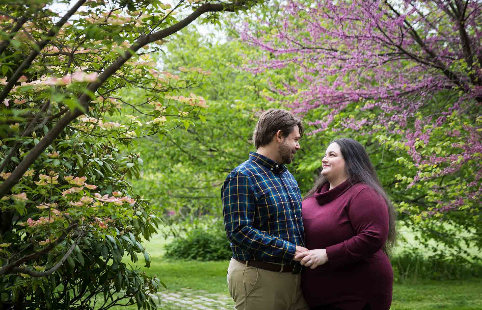 Snug Harbor engagement photos of couple in garden