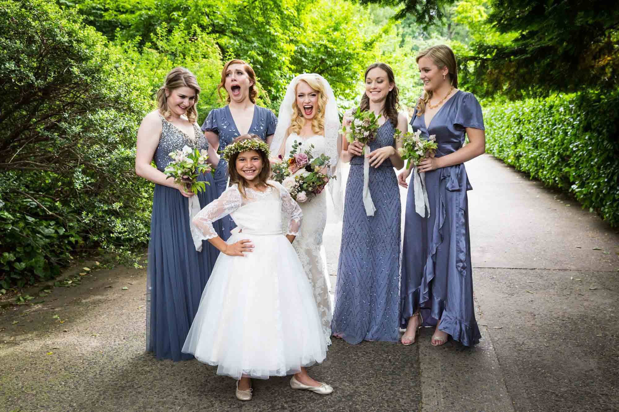 Bride and bridesmaids in Central Park Conservatory Garden