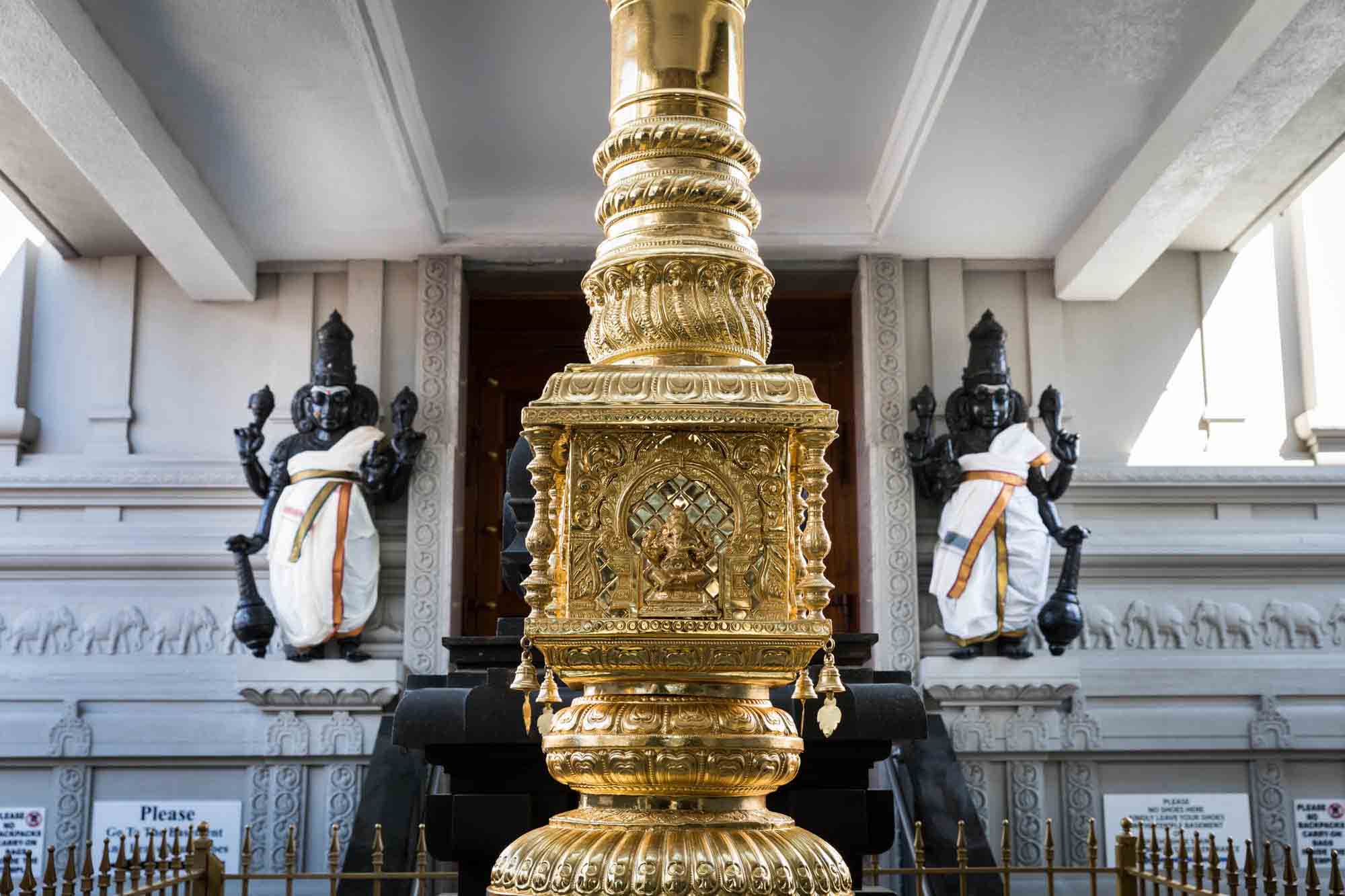 Gold sacred statue at the Hindu Temple Society of North America in Flushing