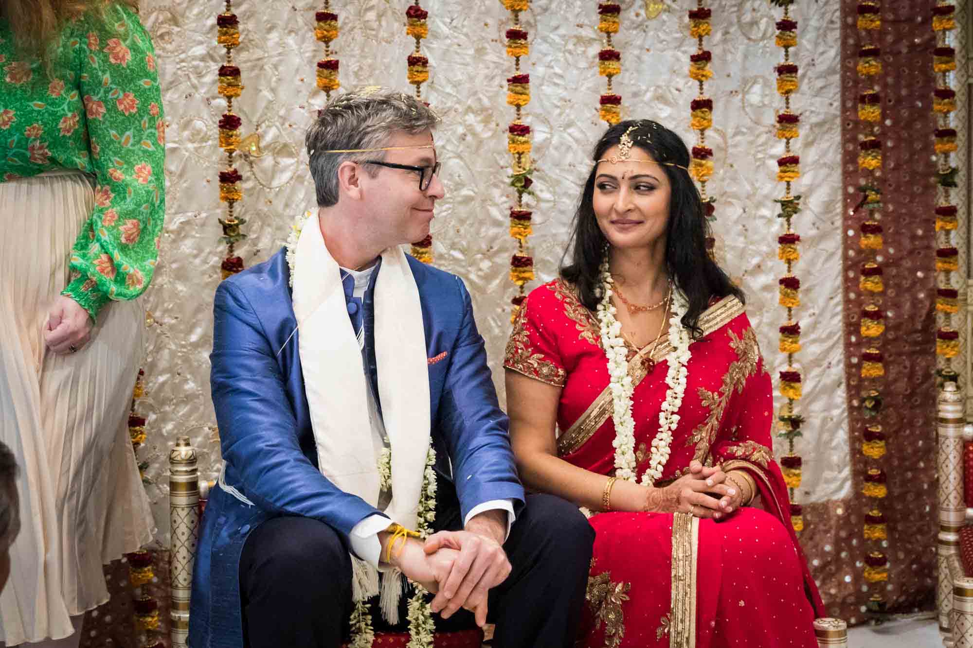 Bride and groom looking at each other at a Hindu Temple Society of North America wedding