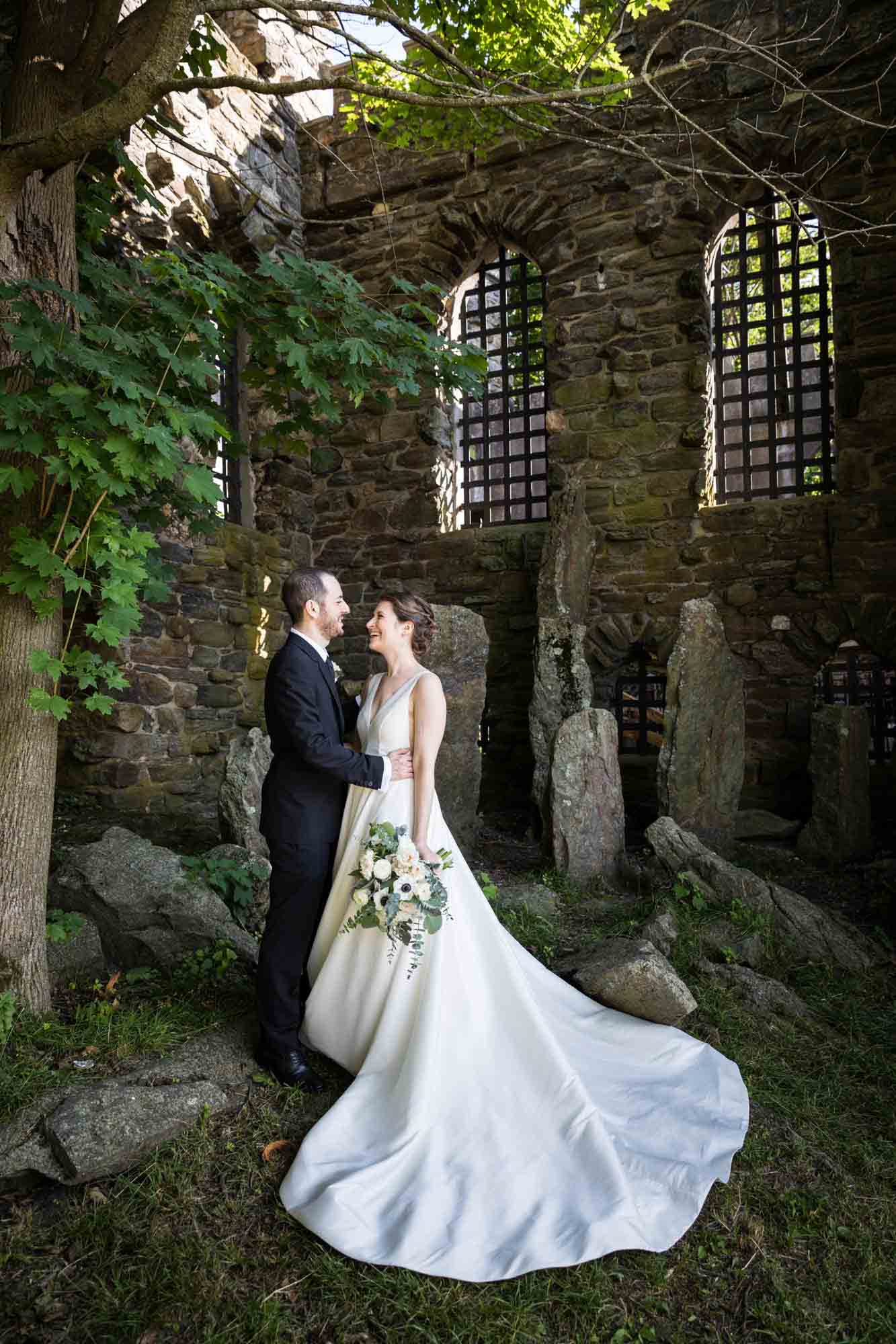 Glen Island Park wedding photo of bride and groom in front of castle ruins