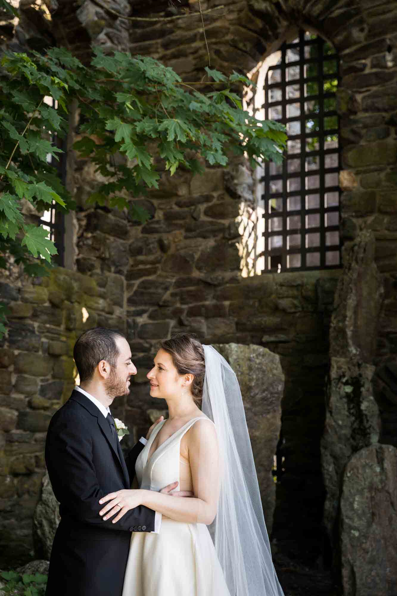 Glen Island Park wedding photo of bride and groom in front of castle ruins
