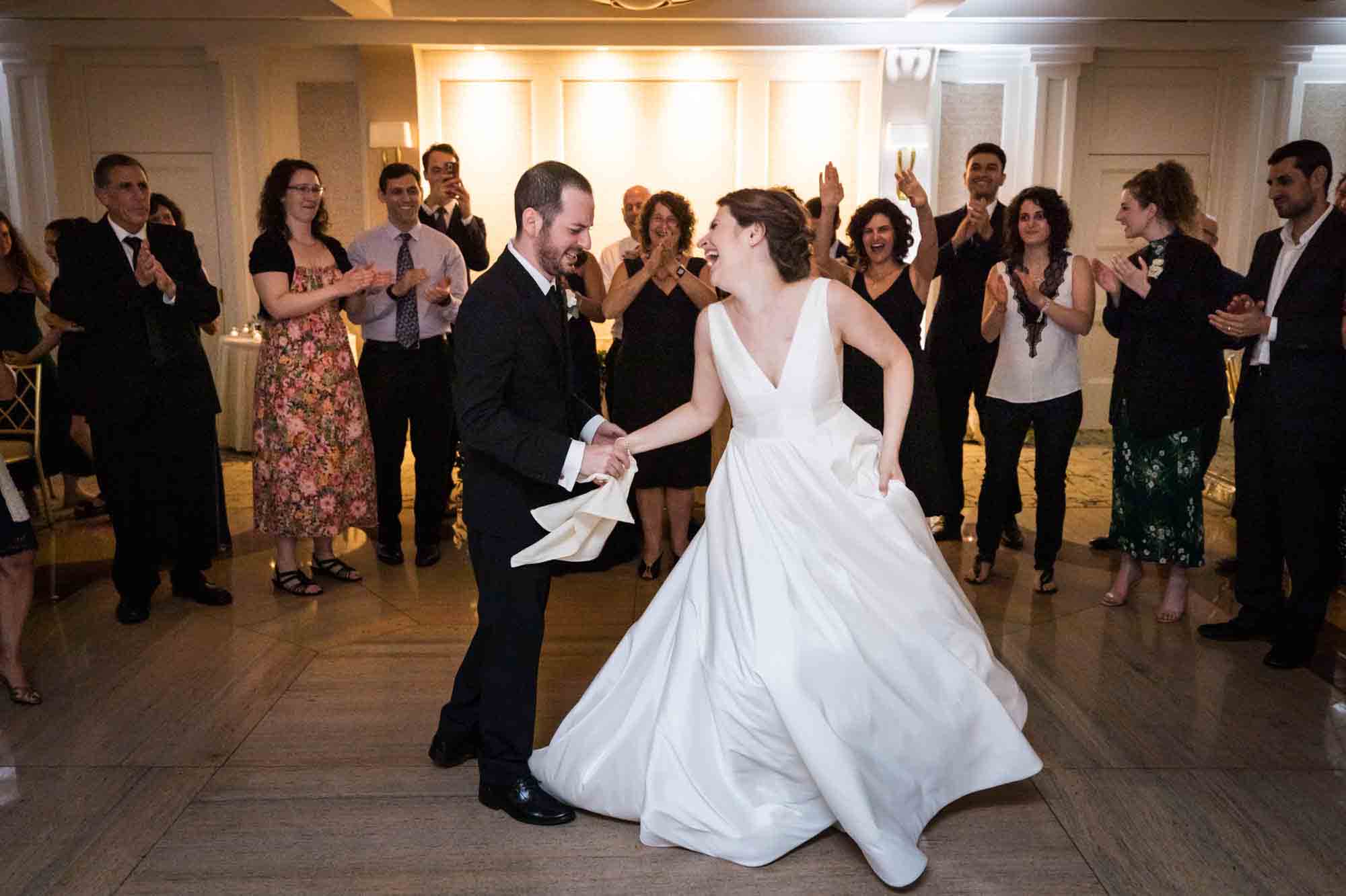 Bride and groom dancing tarantella at a Glen Island Harbour Club wedding