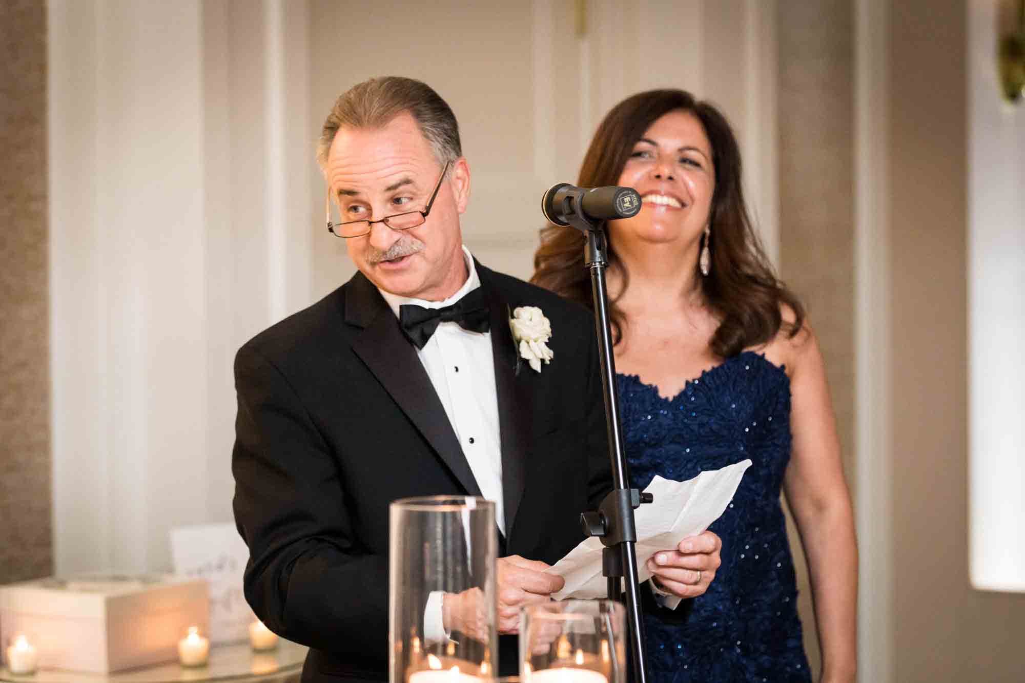 Parents giving a speech at a Glen Island Harbour Club wedding