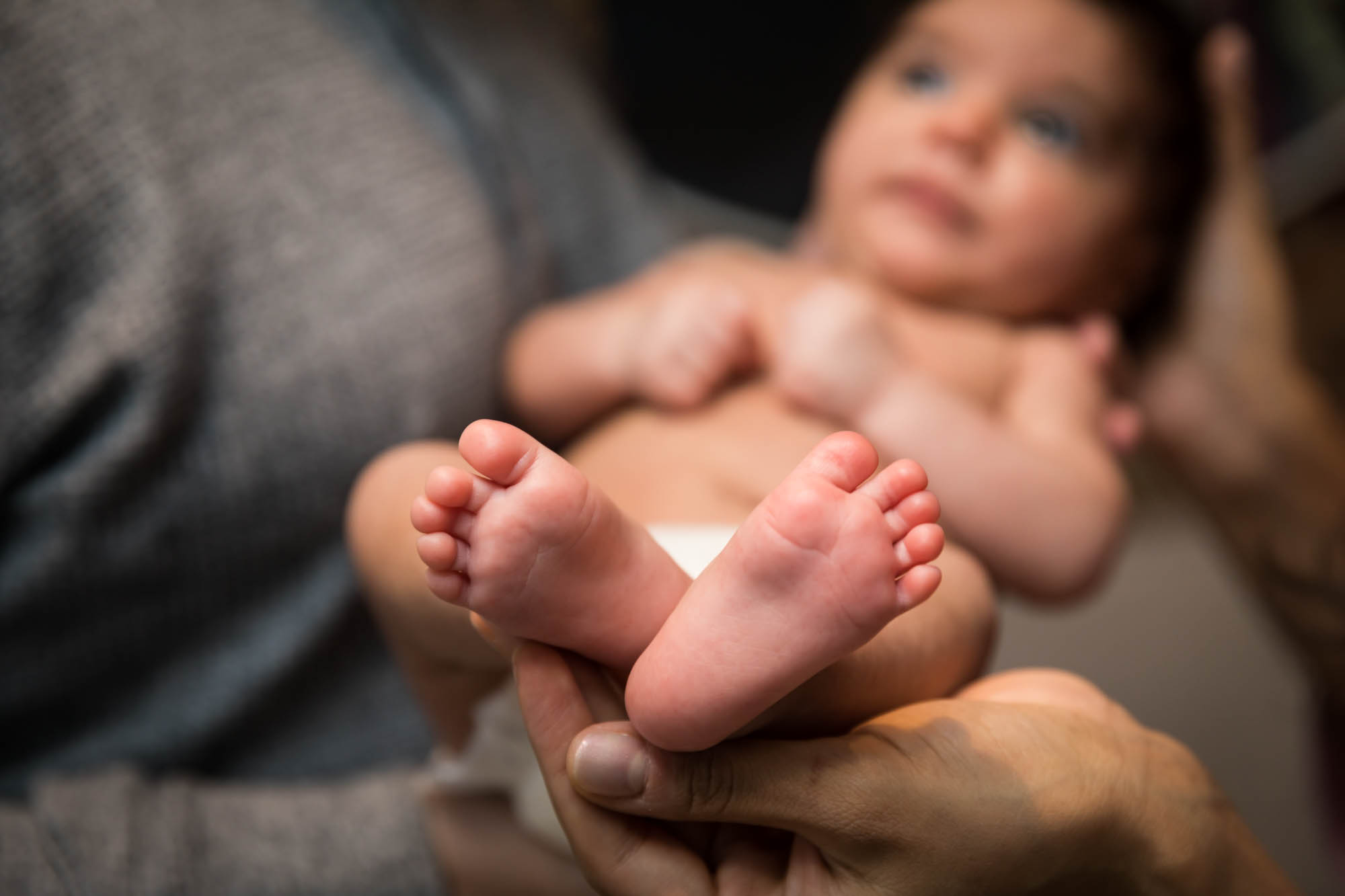 Close up of newborn baby feet