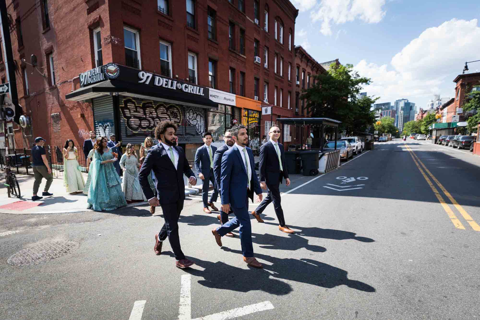 Bridal party at Loft Story wedding walking in crosswalk