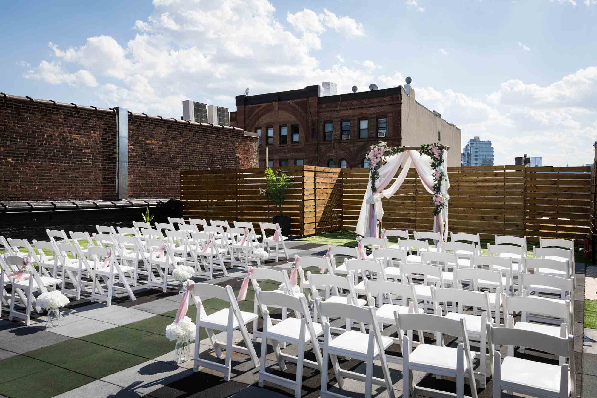 Chairs and altar set up for ceremony at Loft Story wedding