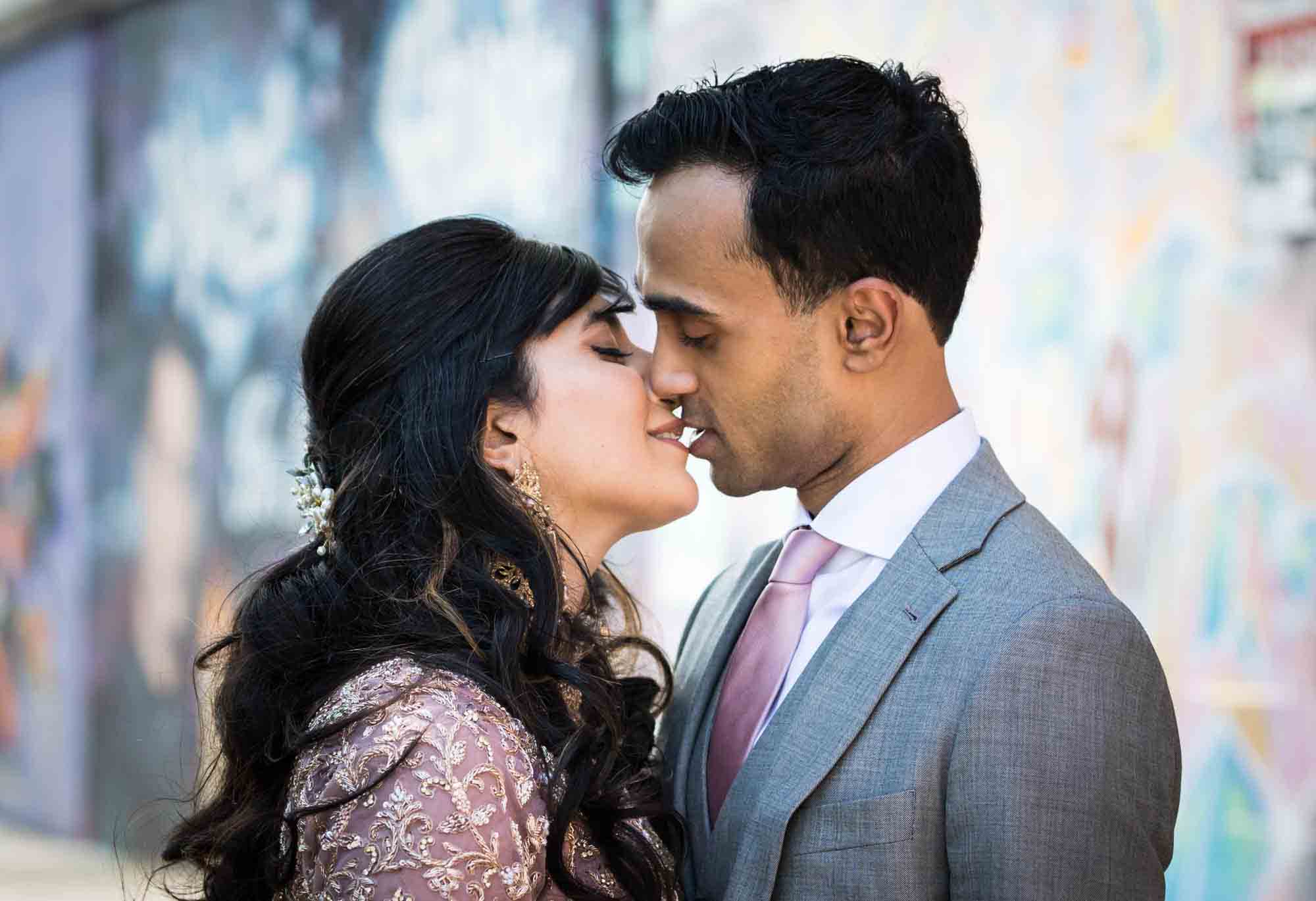 Bride and groom about to kiss before Loft Story wedding