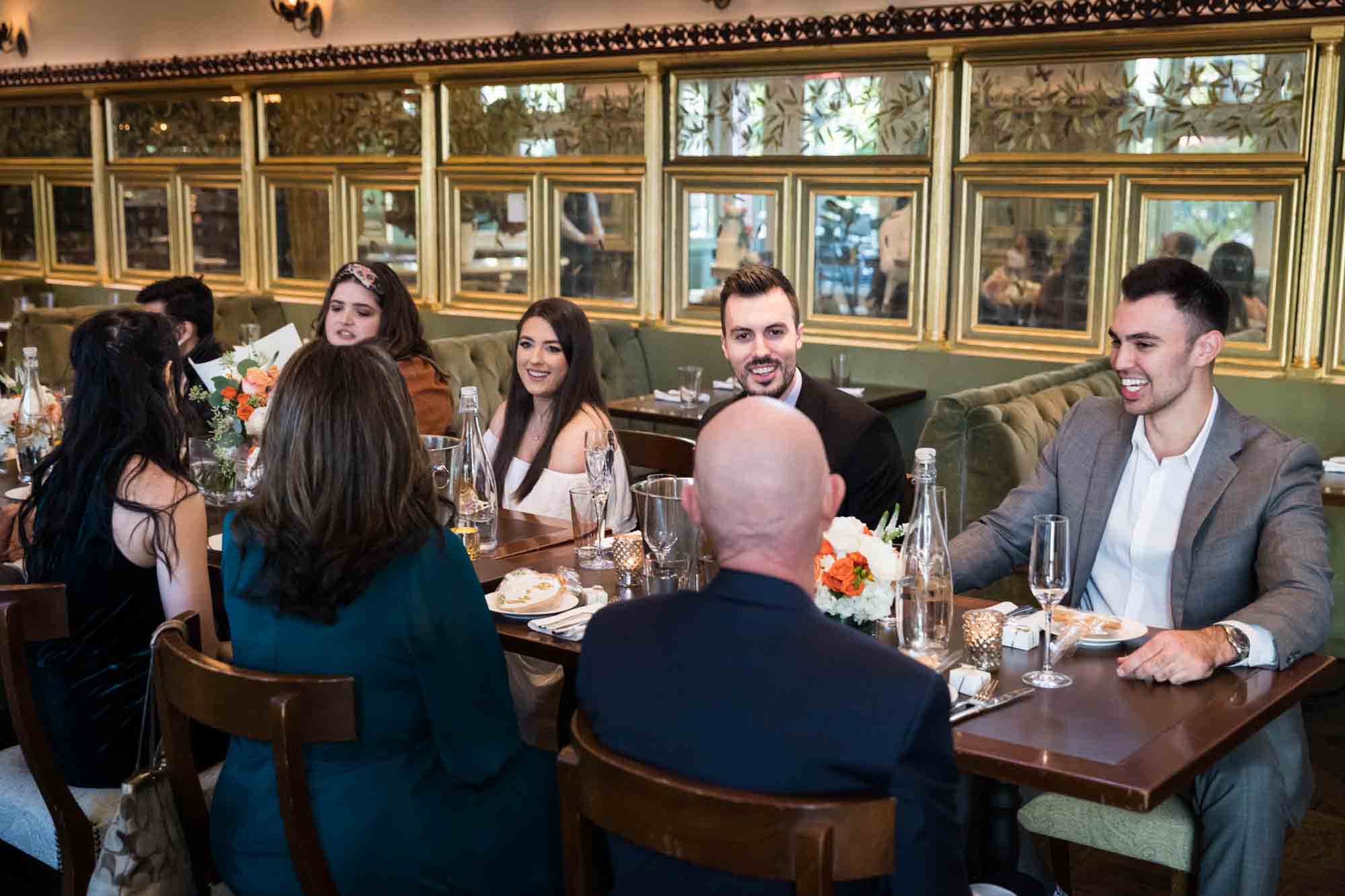 Bridal party sitting at table during Tavern on the Green wedding reception 