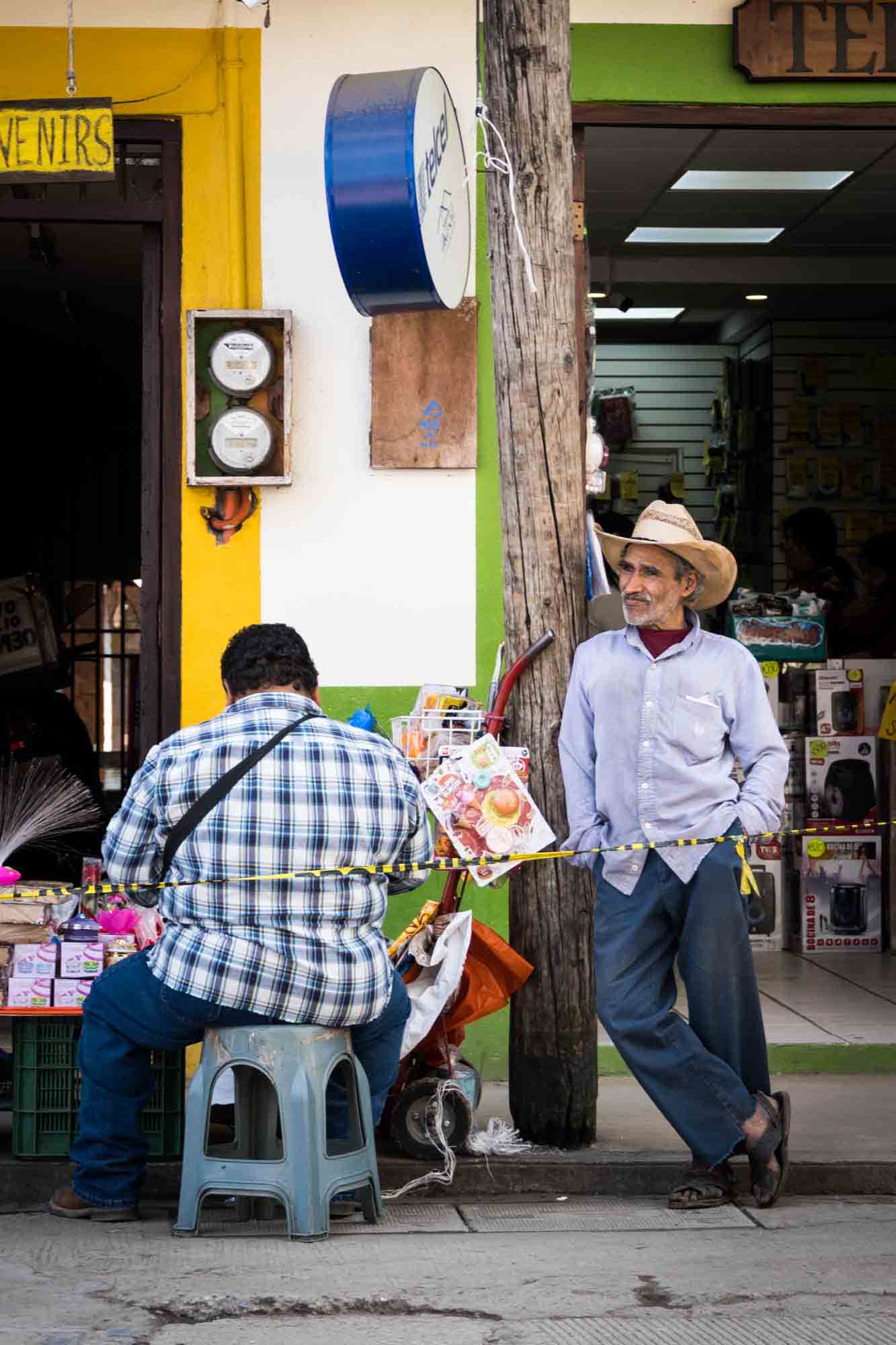 An older man wearing a cowboy hat on the streets of Xilitla, Mexico