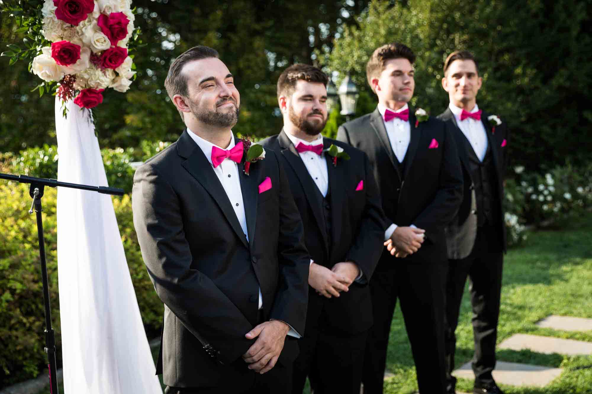 Groom and groomsmen waiting for bride during ceremony at a Briarcliff Manor wedding