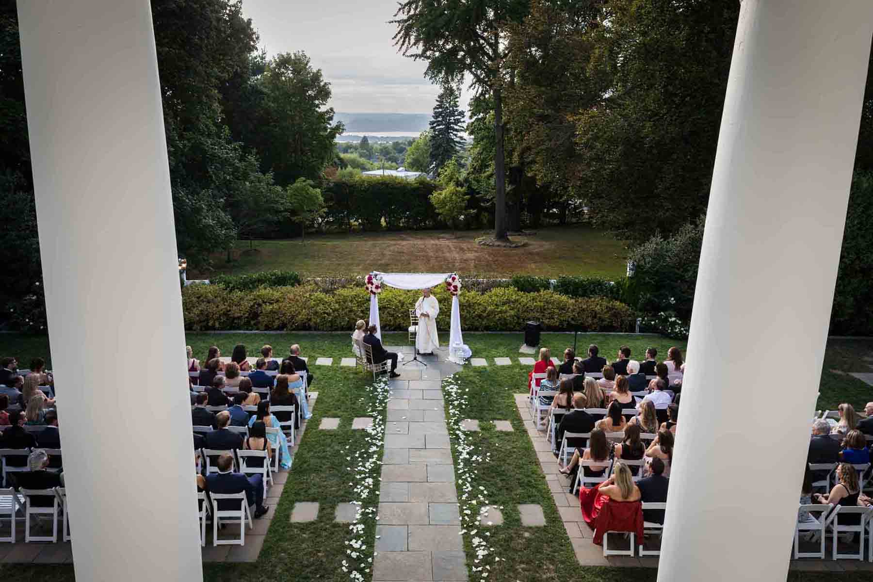 Second floor view of outdoor ceremony at a Briarcliff Manor wedding