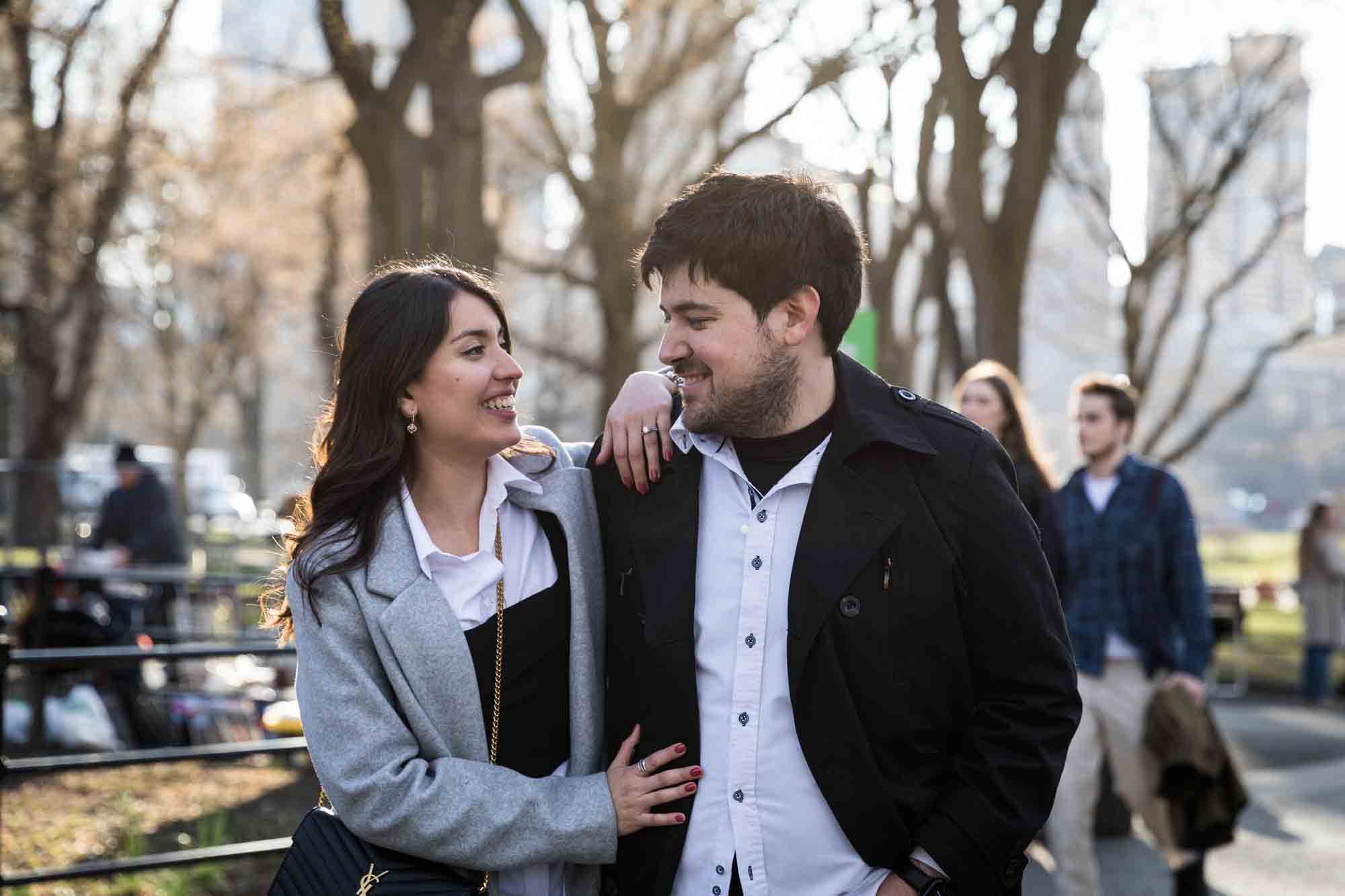 Couple walking in Central Park after a NYC surprise proposal