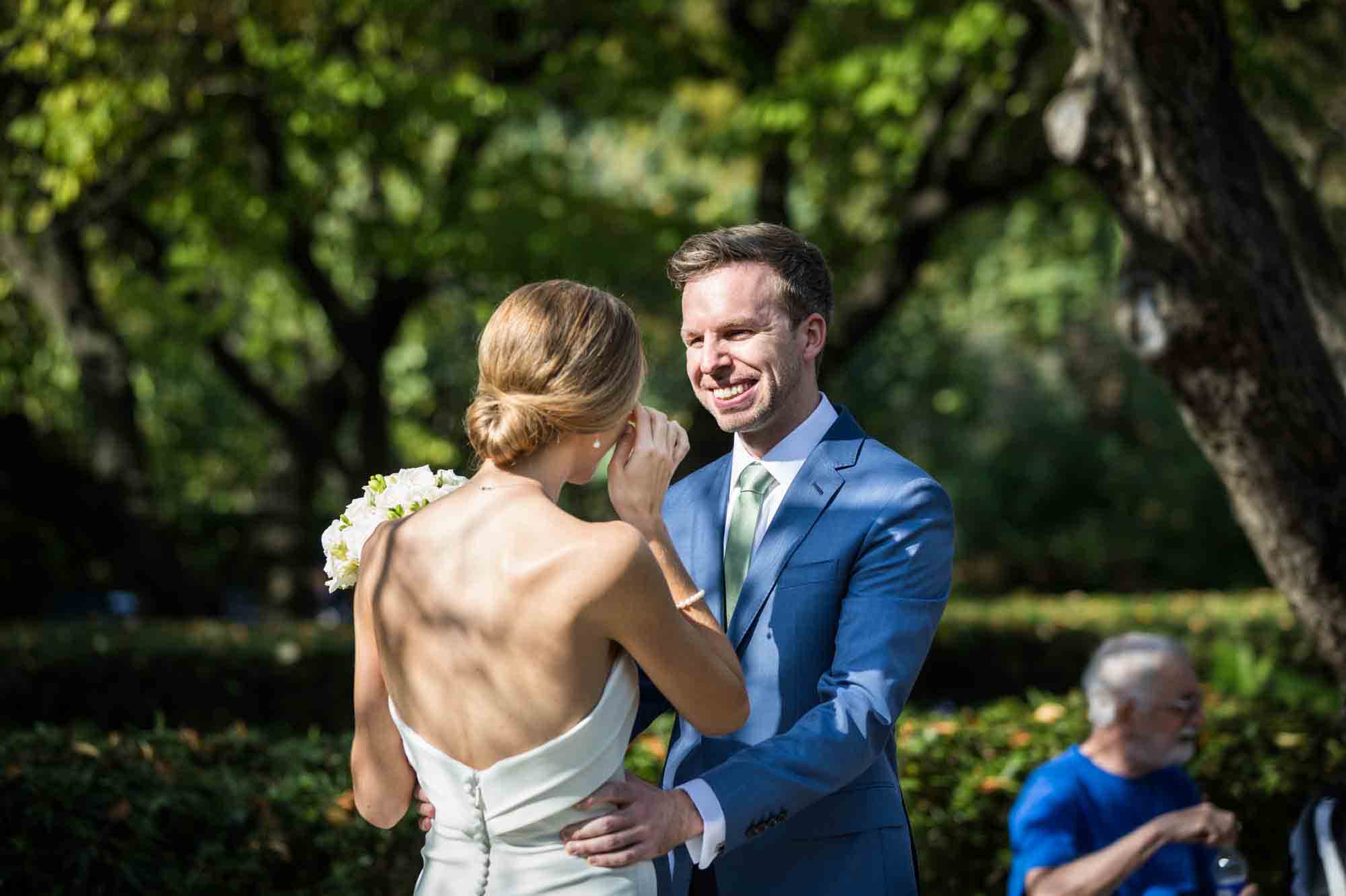 Conservatory Garden wedding photos of groom seeing bride for first time during first look