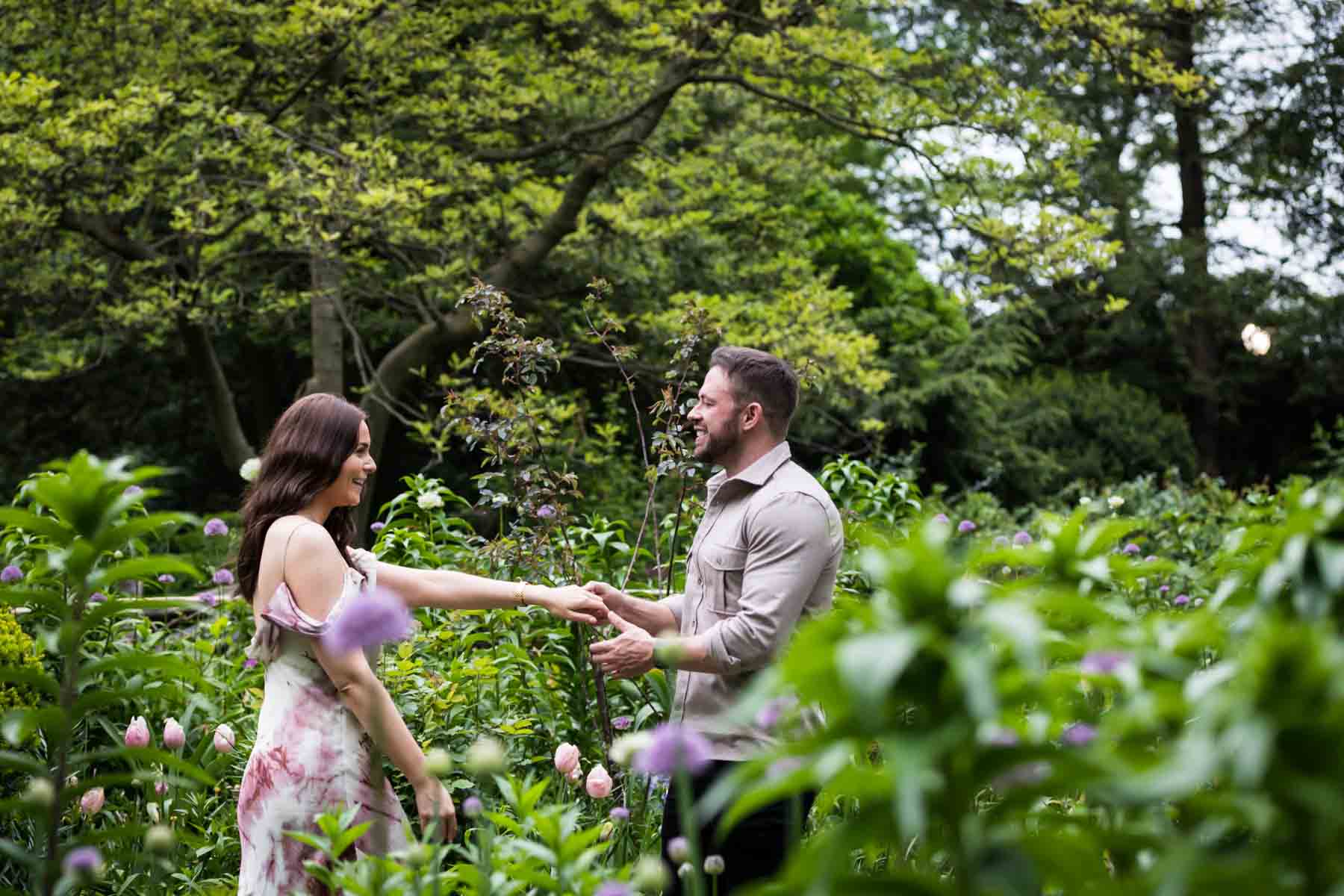 Couple dancing in Shakespeare Garden for an article on the best places to propose in Central Park