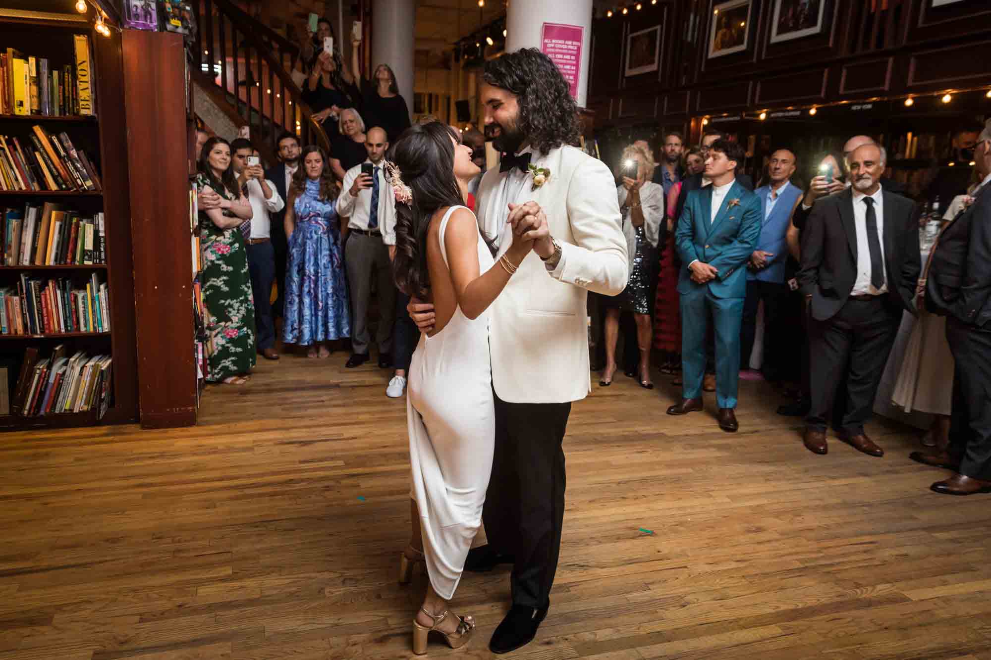 Bride and groom dancing closely during first dance during a Housing Works wedding