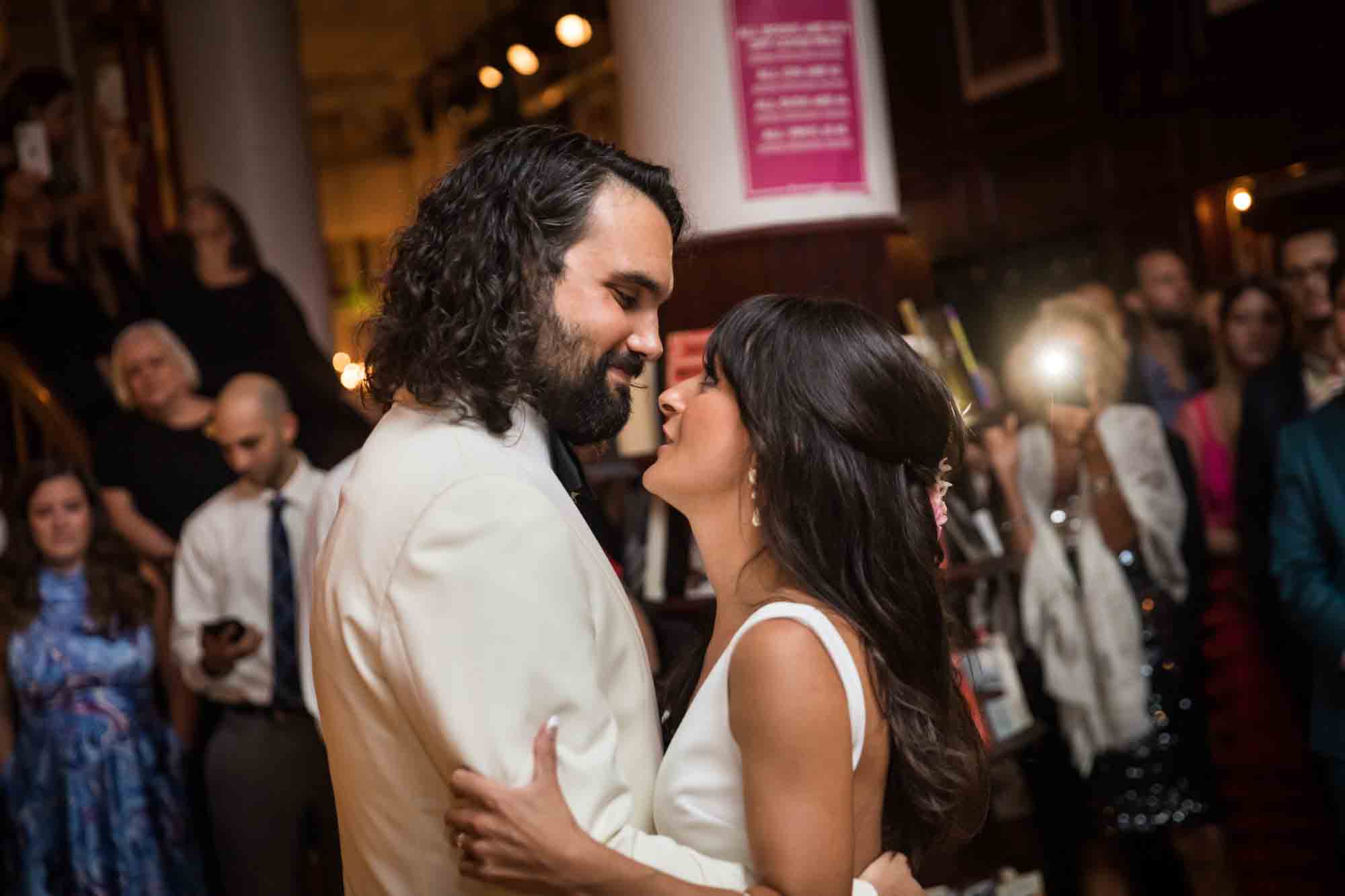 Groom and bride looking at each other during first dance during a Housing Works wedding