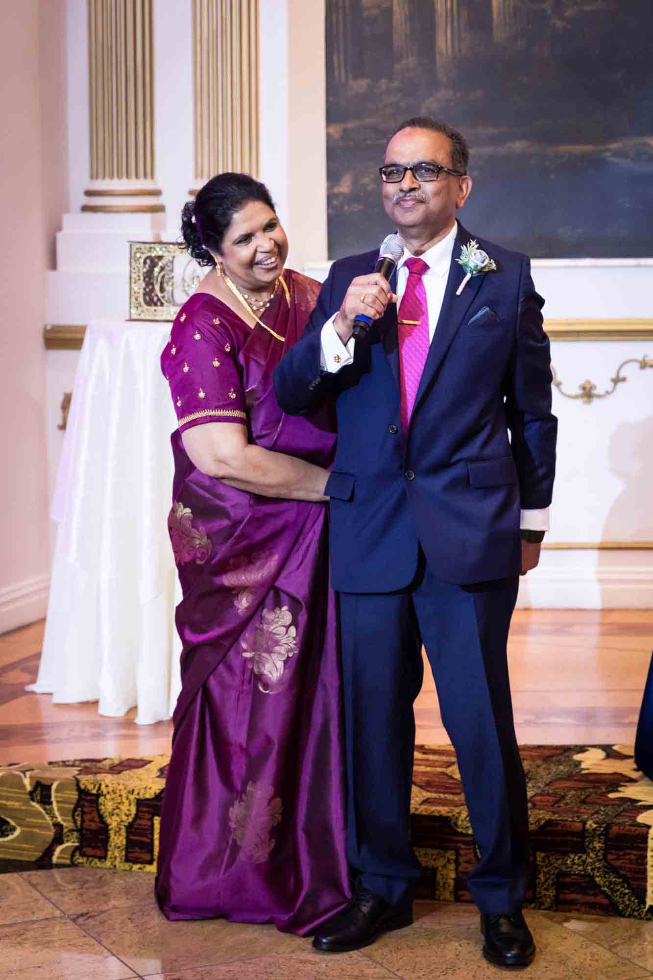 Indian woman and man making speech during a Terrace on the Park wedding