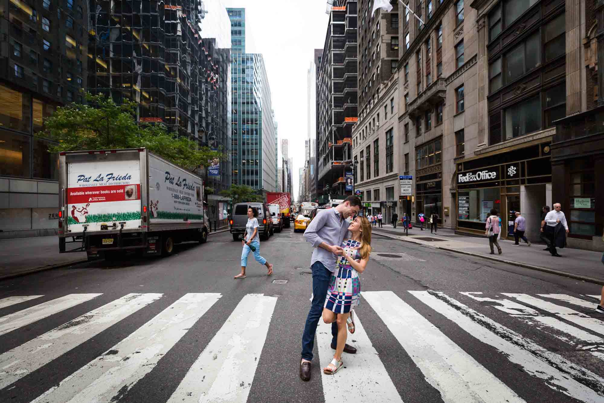 Couple hugging together in the middle of a NYC crosswalk
