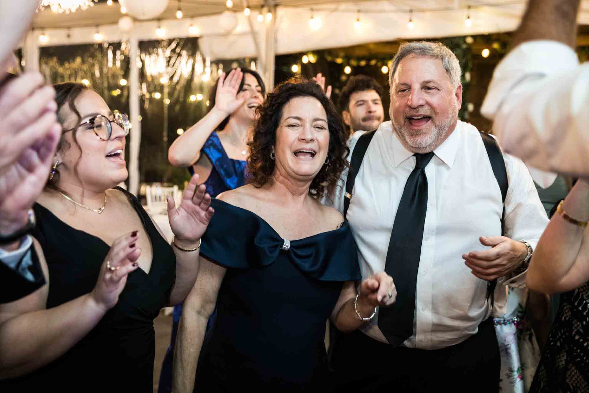 Guests dancing and enjoying reception at a Sanctuary Roosevelt Island wedding