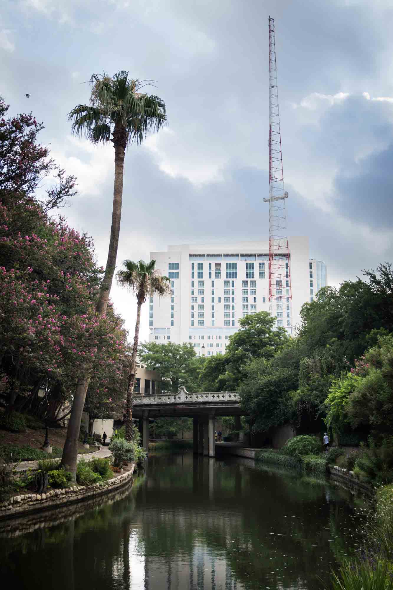 Building and radio tower along the Riverwalk in San Antonio
