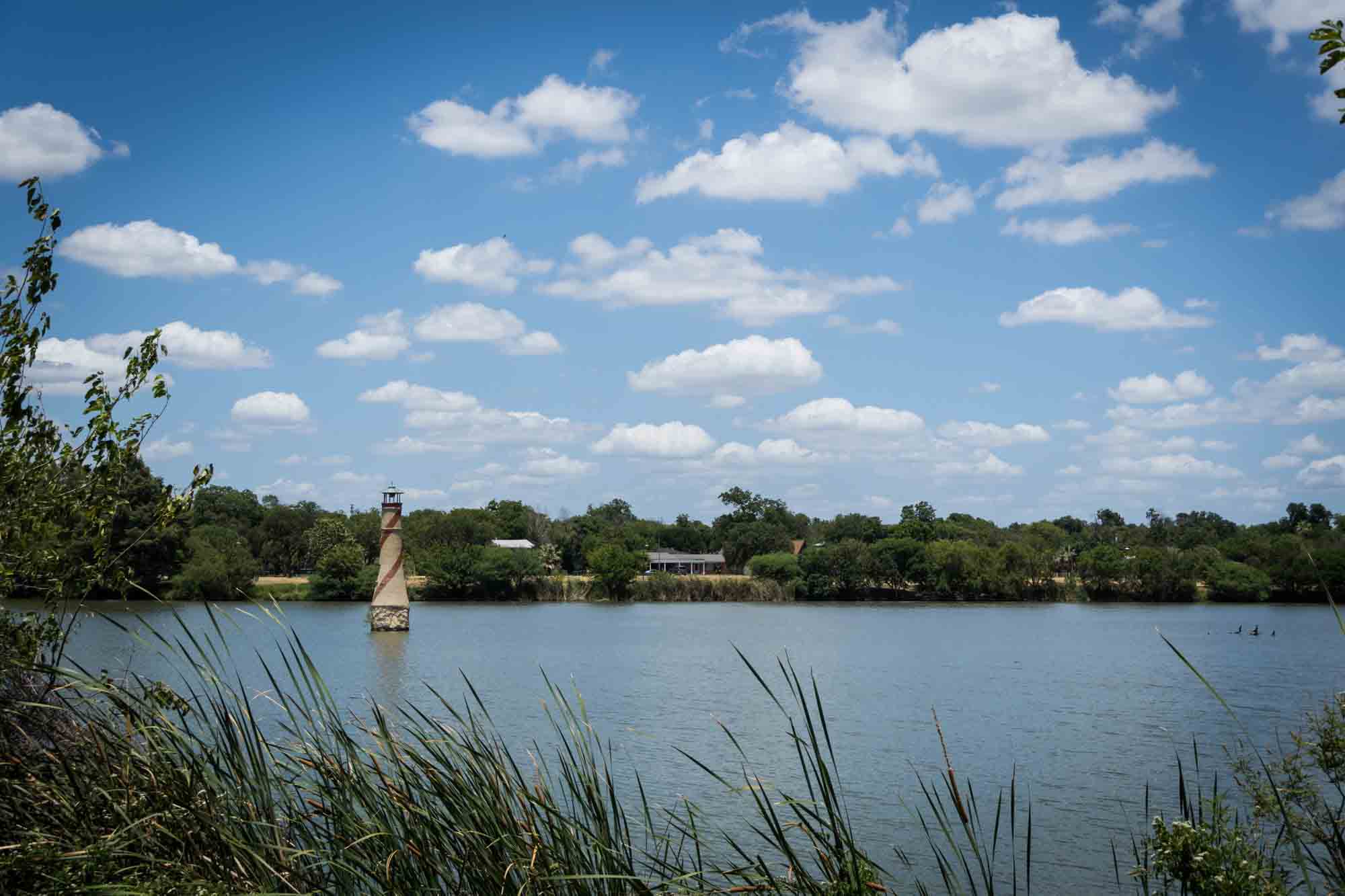 Lighthouse in lake at Woodlawn Lake Park in San Antonio