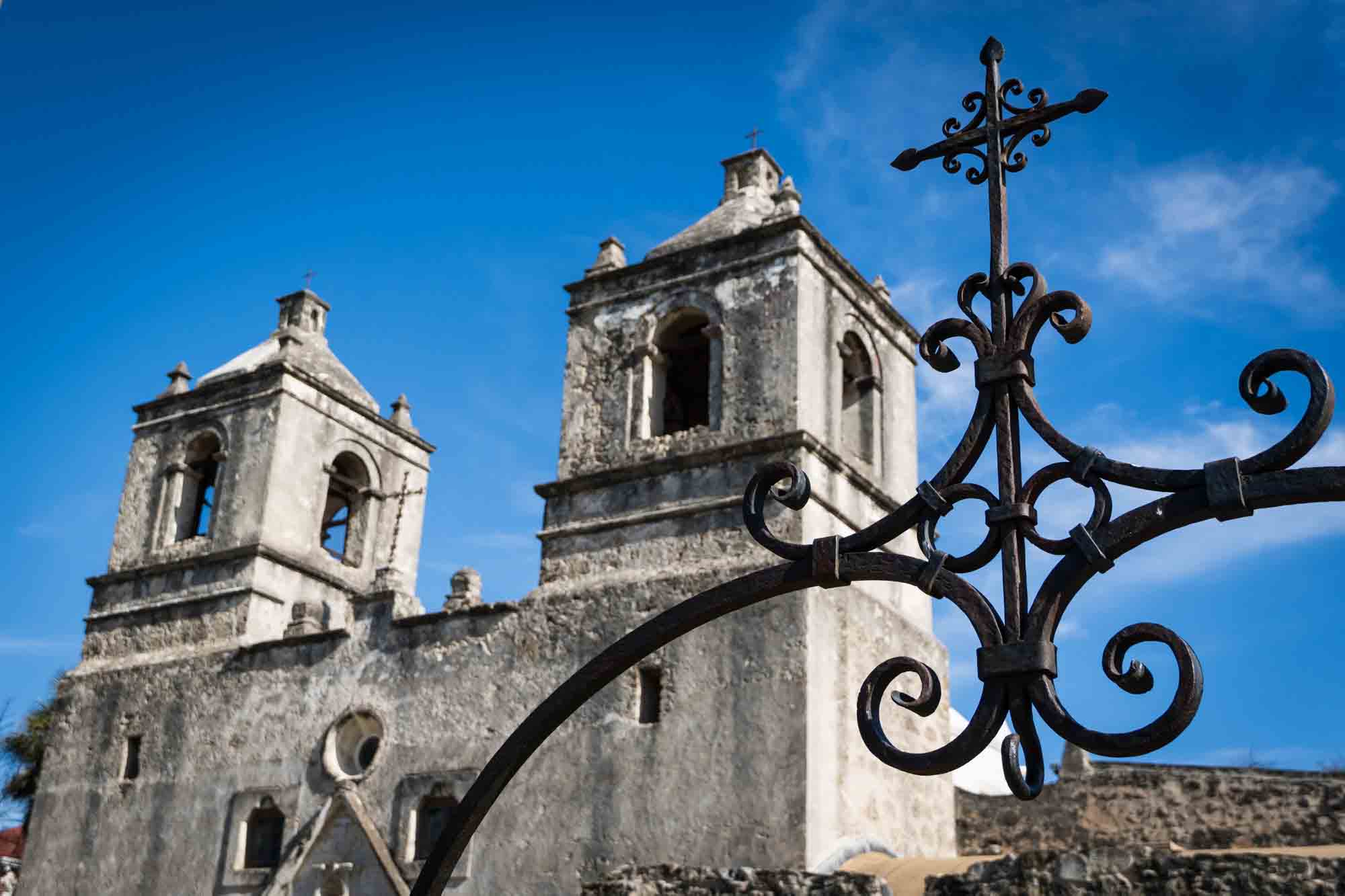 Church towers and iron cross at Mission Concepcion by San Antonio photographer, Kelly Williams