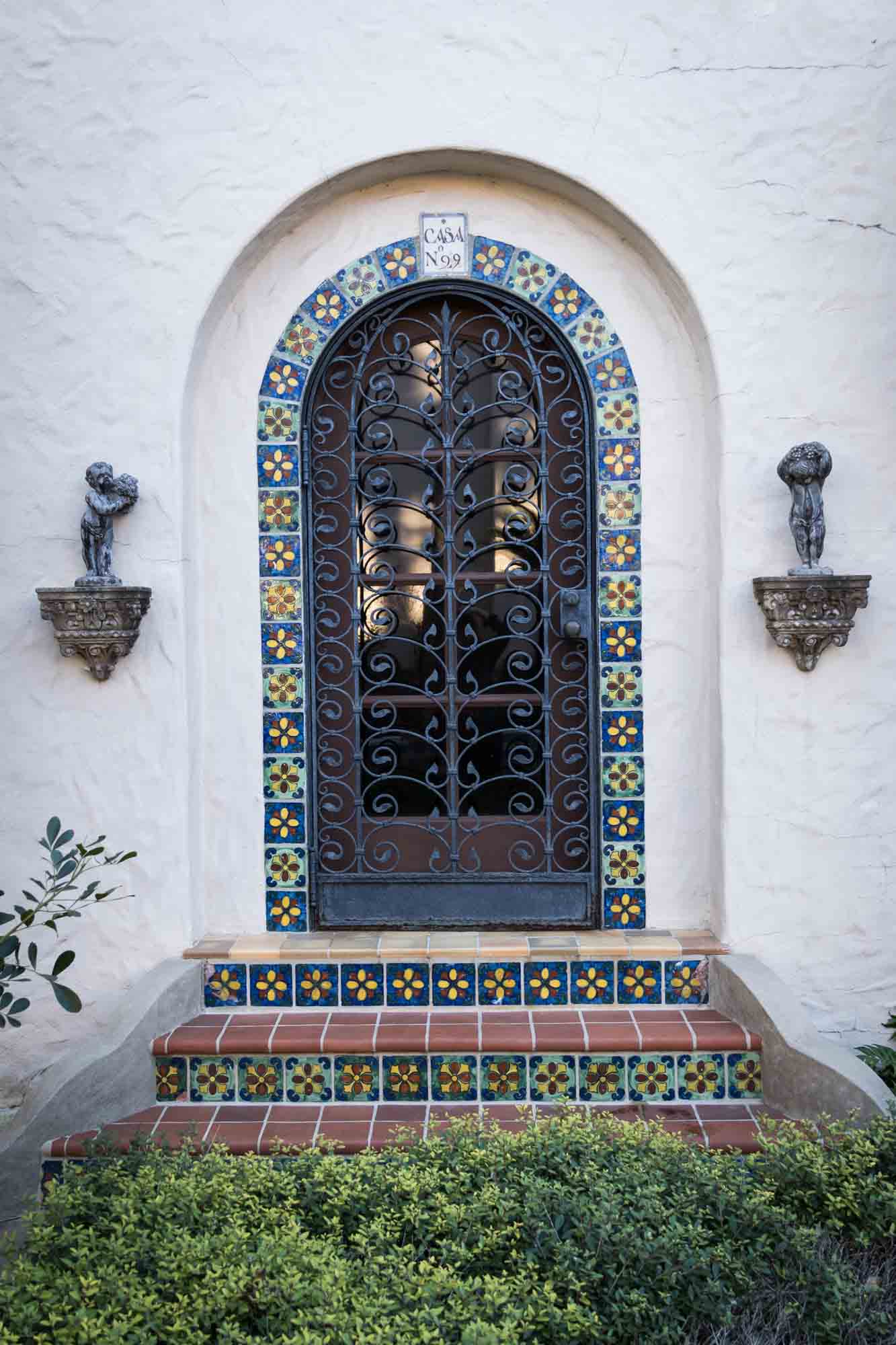 Doorway surrounded by colorful tiles in Blackburn Patio for an article on how to take photos at the McNay Art Museum