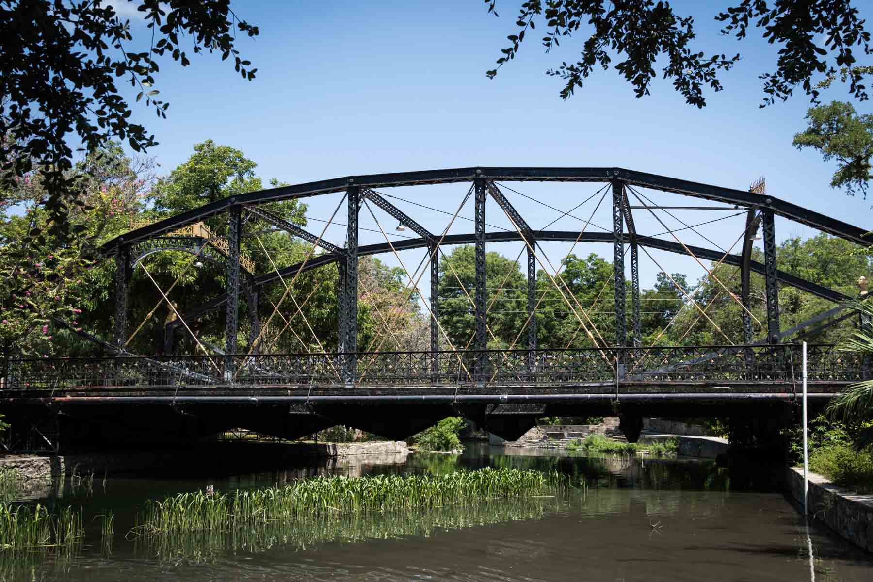 Bridge across river in Brackenridge Park for an article on the best San Antonio parks for family portraits