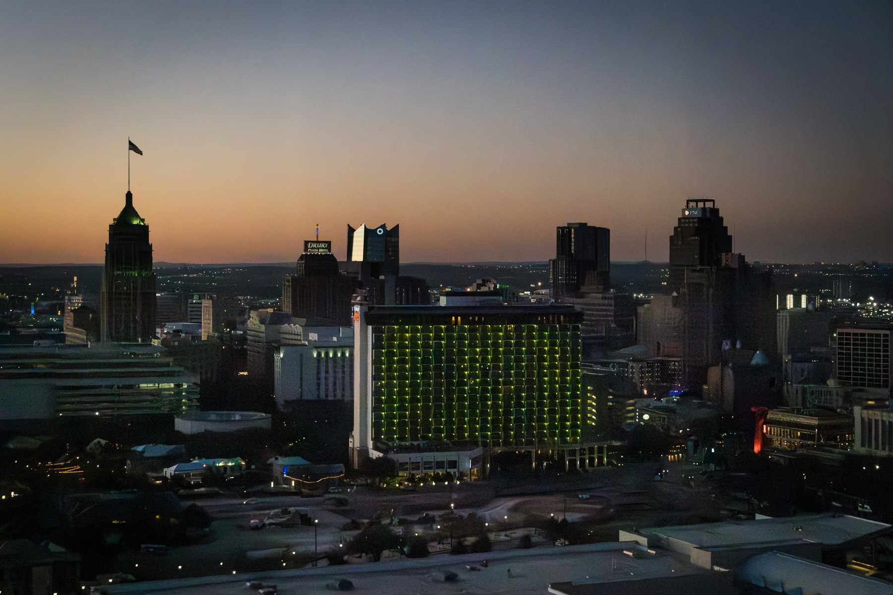 View of San Antonio skyline at dusk for an article on how to propose at the Tower of the Americas