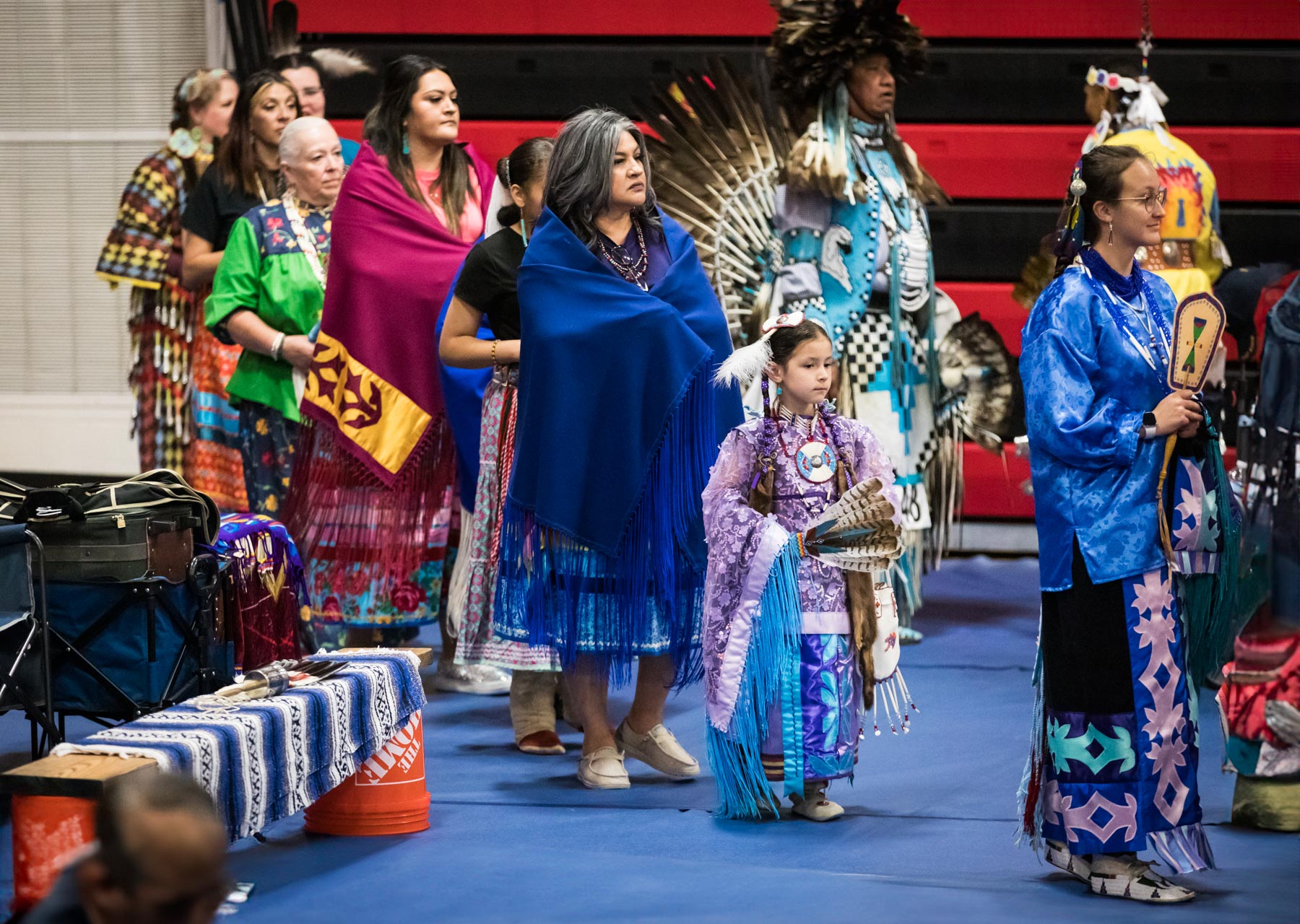 Female American Indians entering sacred space during pow wow for an article on the best Fiesta photos