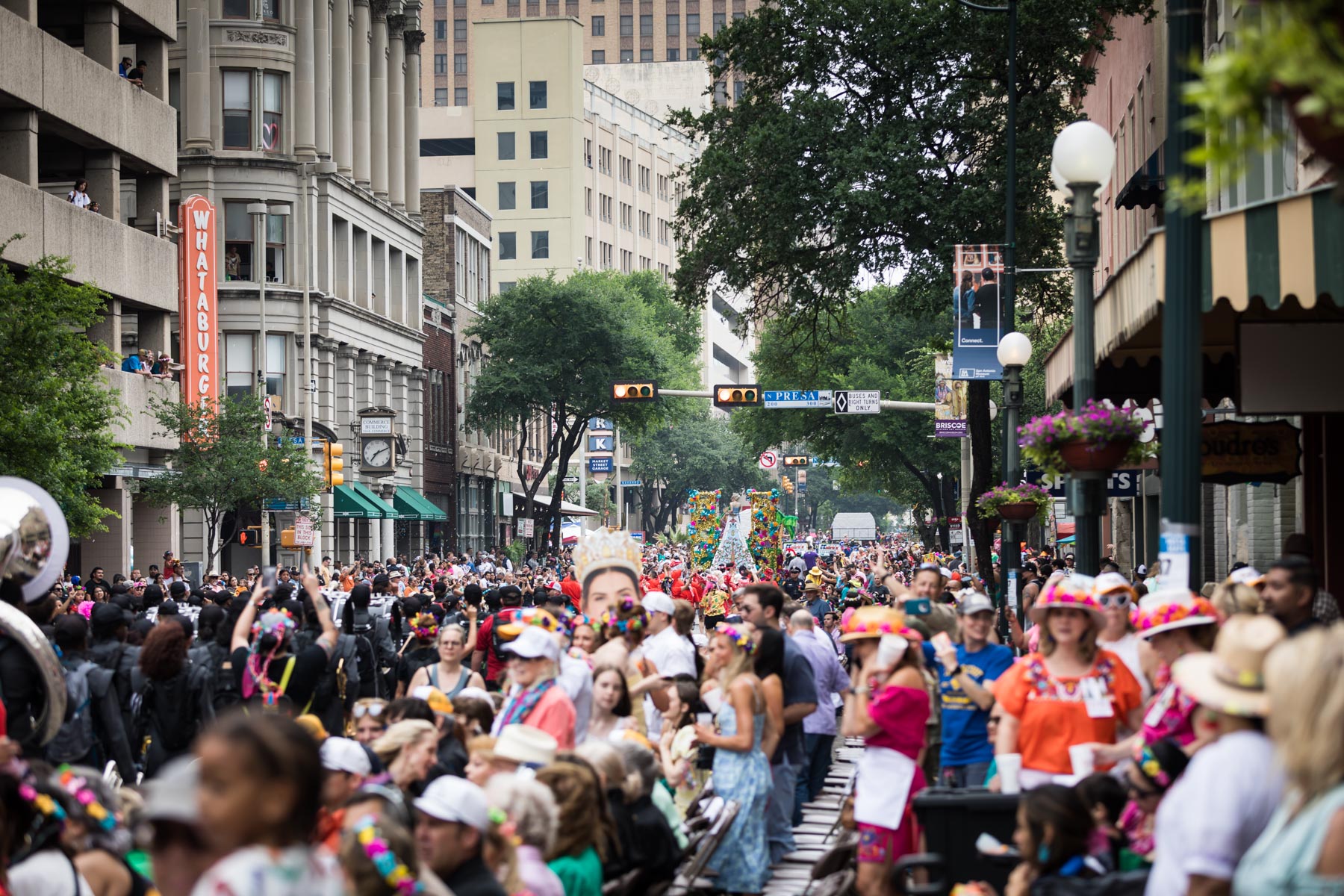 Huge crowds in San Antonio during Battle of Flowers parade for an article on the best Fiesta photos
