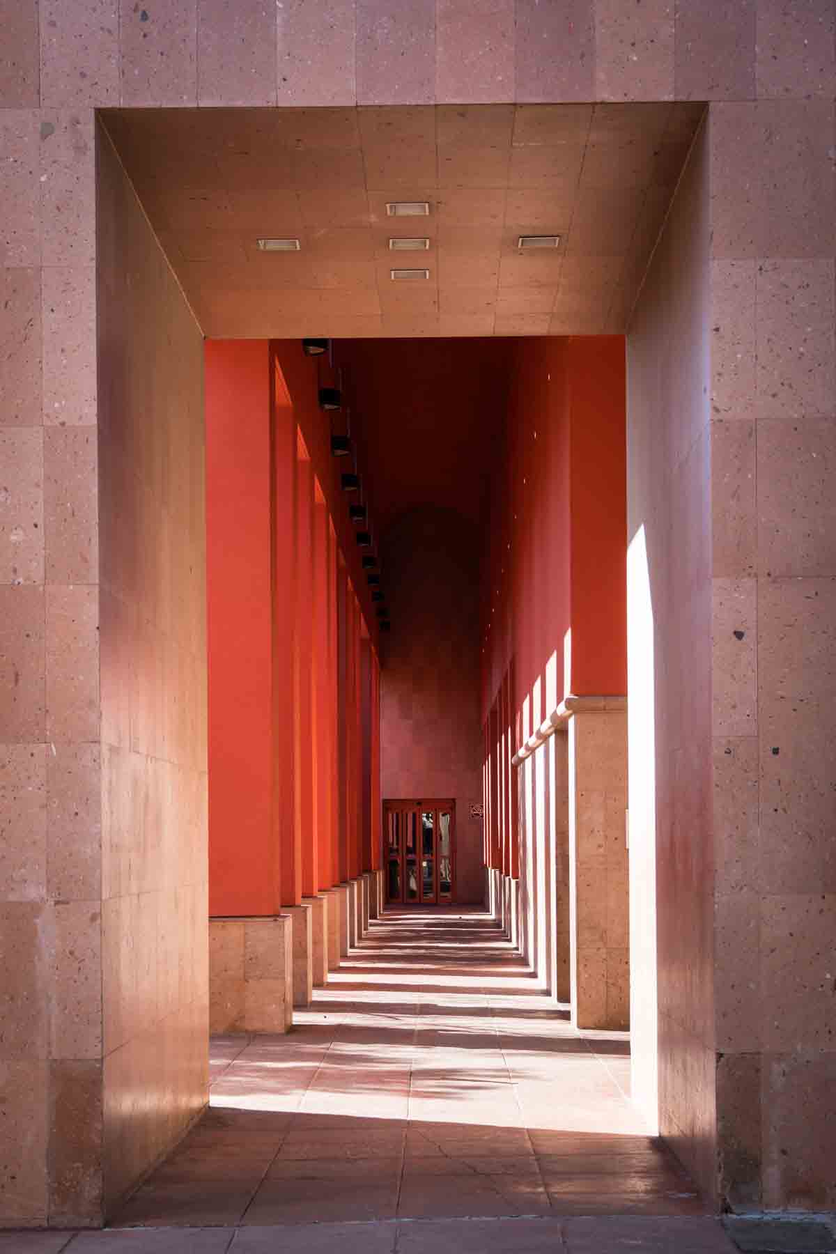 Tunnel through columns at the Central Library for an article on secret San Antonio photo shoot locations