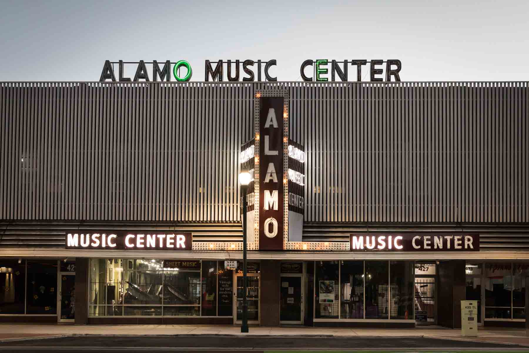 Front entrance and neon signage of Alamo Music Center for an article on secret San Antonio photo shoot locations