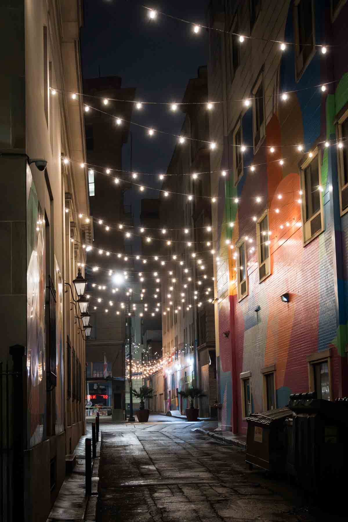 Peacock Alley at night lit with string lights for an article on secret San Antonio photo shoot locations