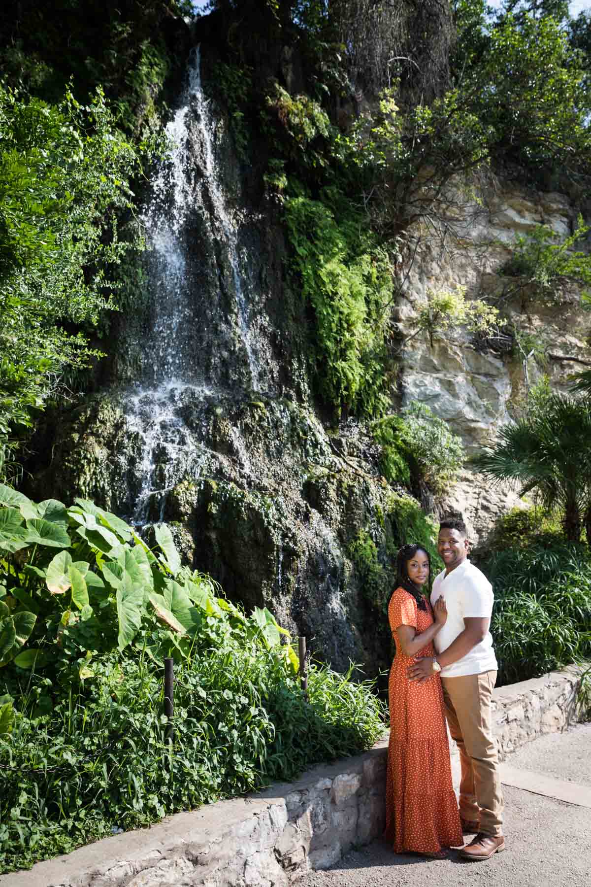 Japanese Tea Garden family portrait of an African American couple standing in front of a waterfall