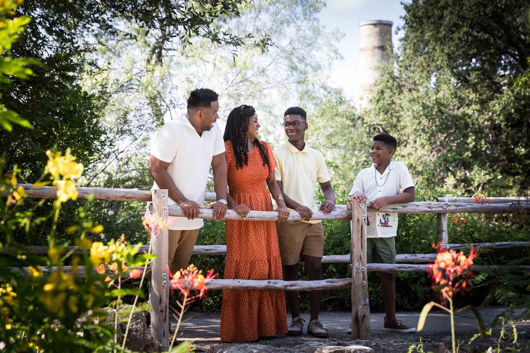 Japanese Tea Garden family portrait of an African American family standing behind a wooden railing