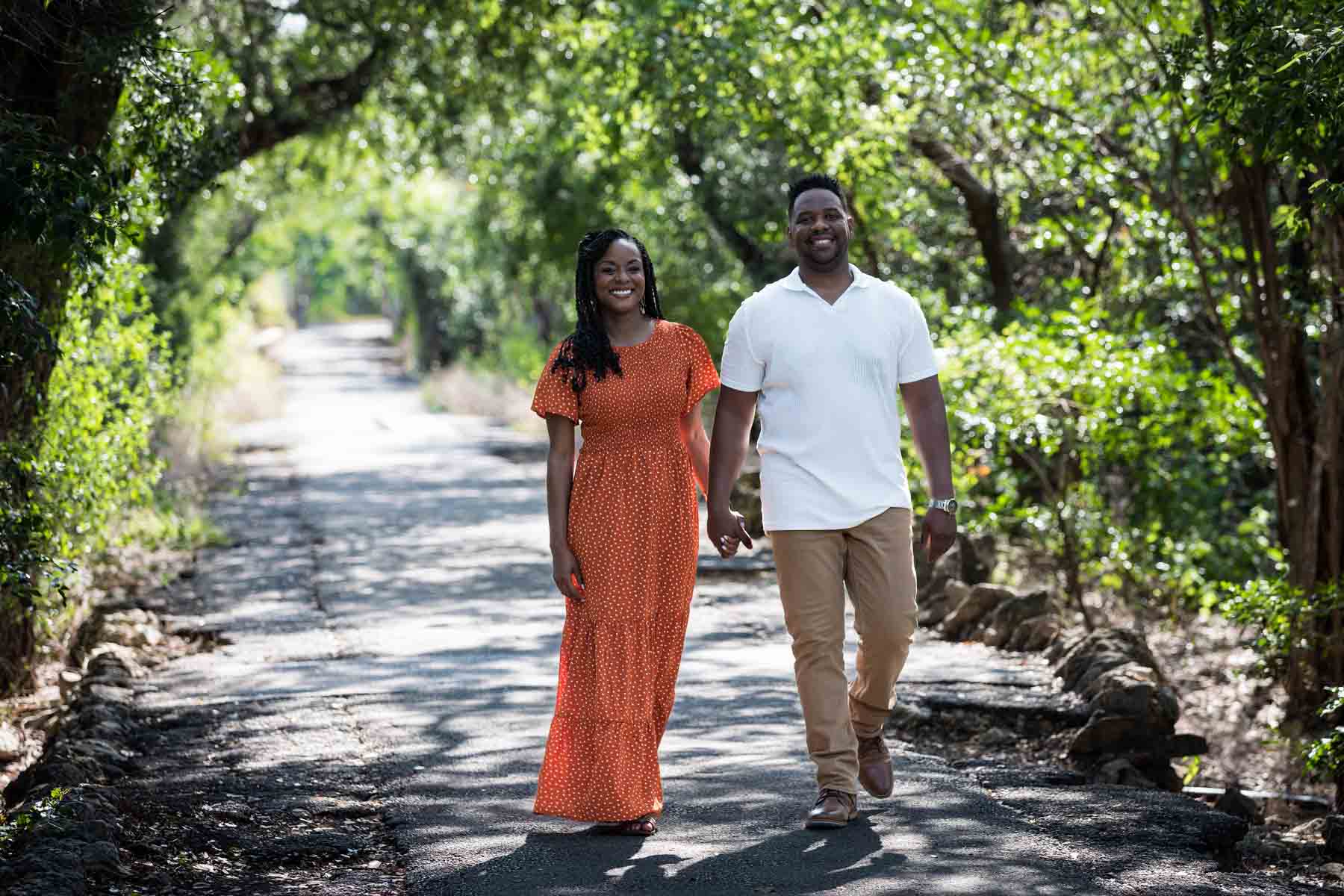 African American couple walking in a forest for a Japanese Tea Garden family photo shoot