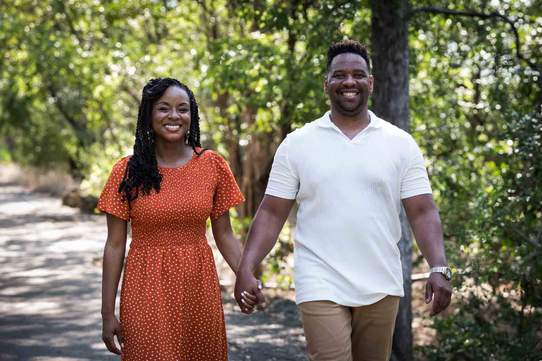 African American couple walking in a forest for a Japanese Tea Garden family photo shoot