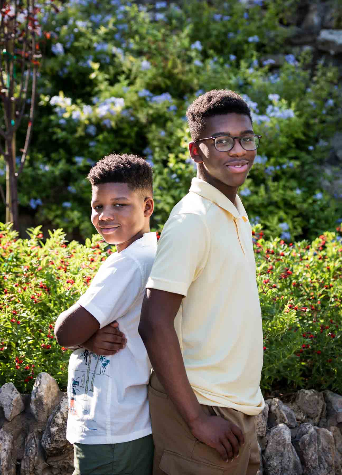 Two African American brothers standing back to back during a Japanese Tea Garden family photo shoot