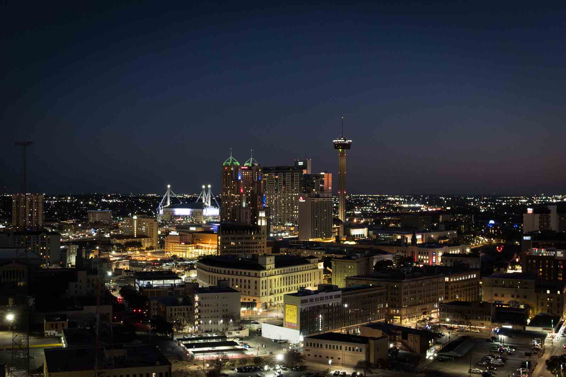 View of San Antonio skyline at night as seen from Moon's Daughters