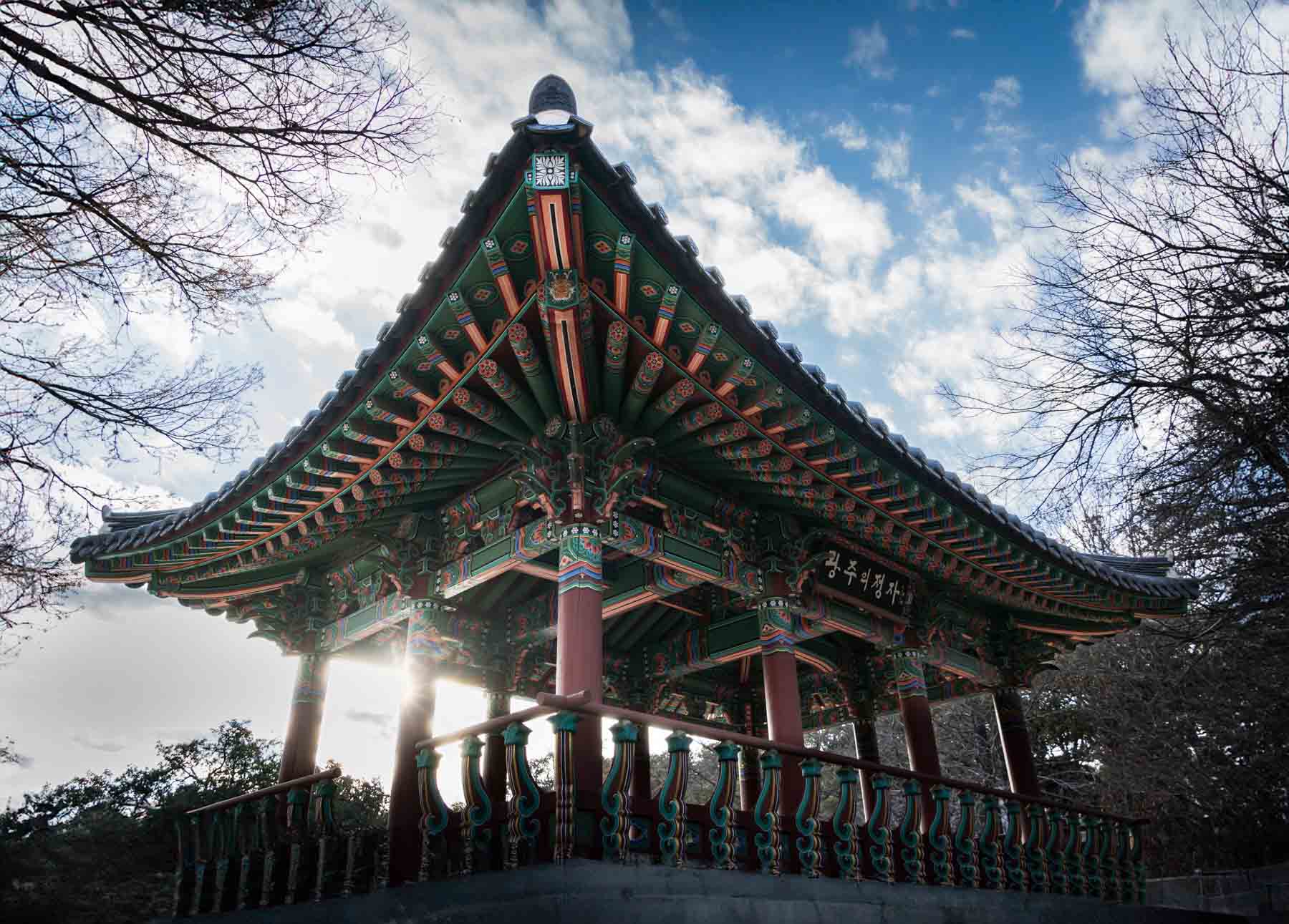 Korean monument against sky and clouds in Denman Estate Park for an article listing the best places to propose in San Antonio