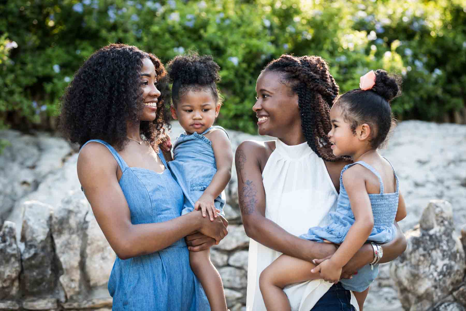 African American sisters and two little girls standing in front of stone staircase at the Japanese Tea Garden for an article on 'How often should I take family photos?'