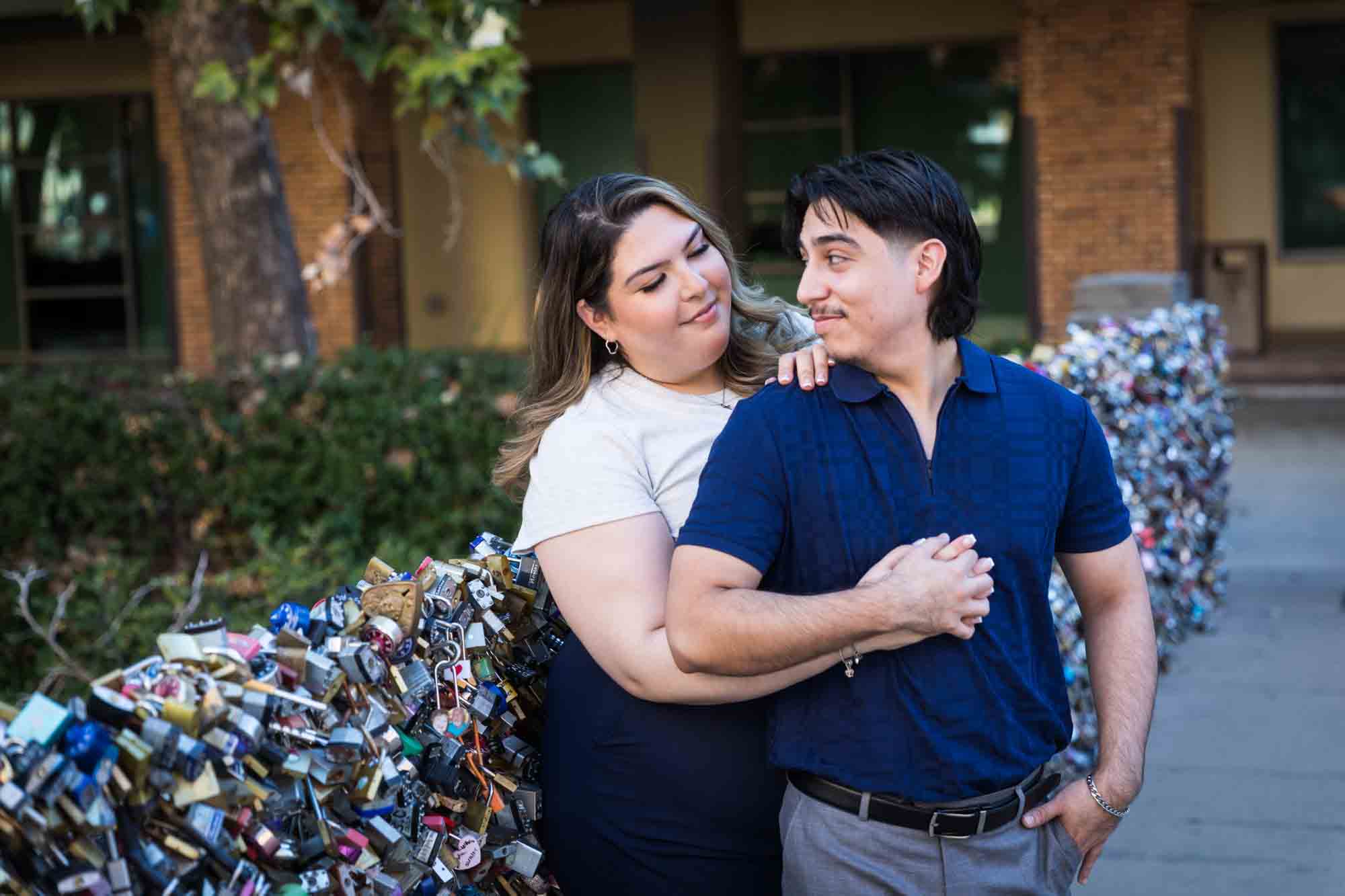 Couple standing in front of lovelock bridge during a San Antonio photo shoot